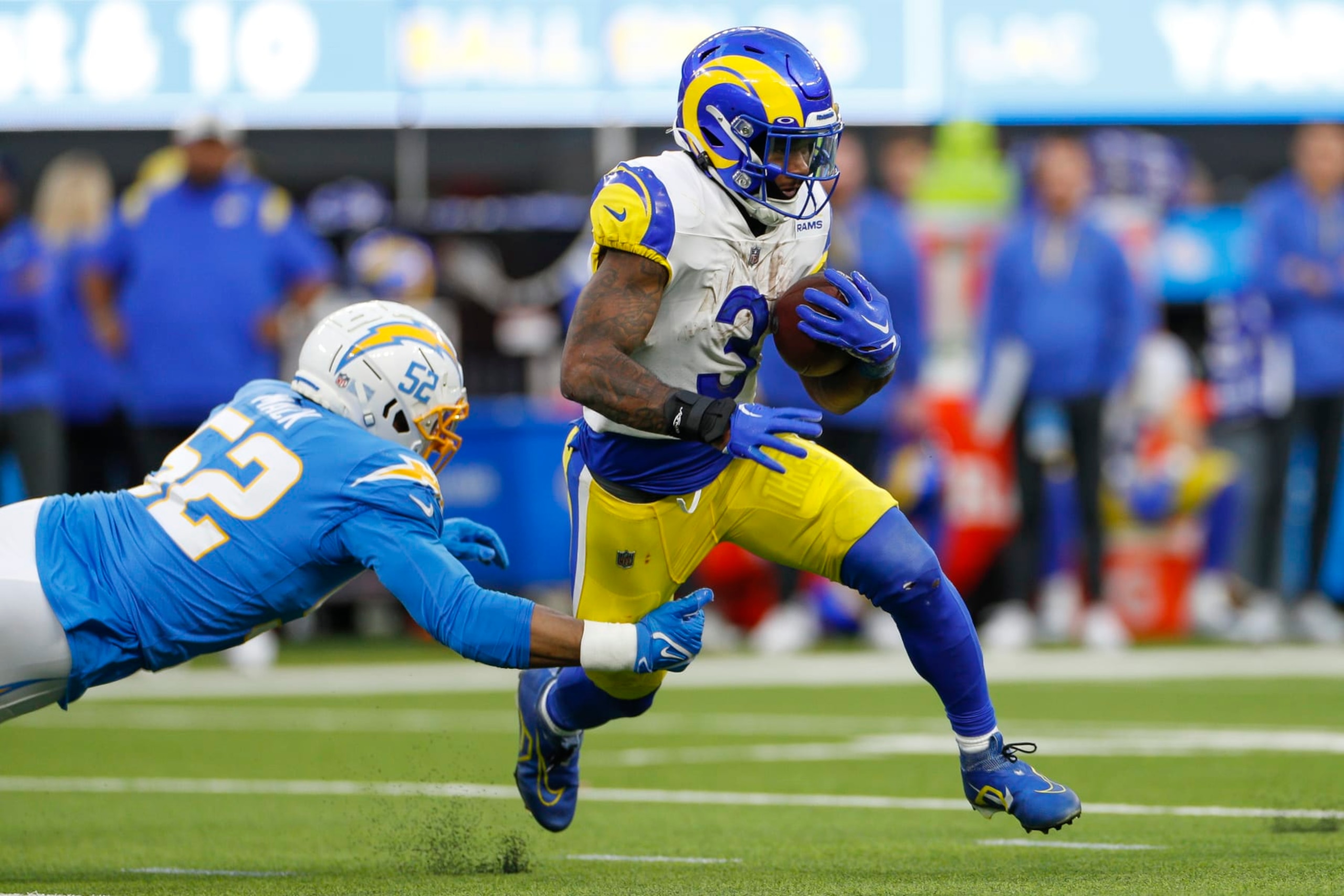 INGLEWOOD, CA - JANUARY 01: Los Angeles Rams running back Cam Akers (3) runs with the ball during an NFL regular season game between the Los Angeles Rams and the Los Angeles Chargers on January 01, 2023, at SoFi Stadium in Inglewood, CA. (Photo by Brandon Sloter/Icon Sportswire via Getty Images)