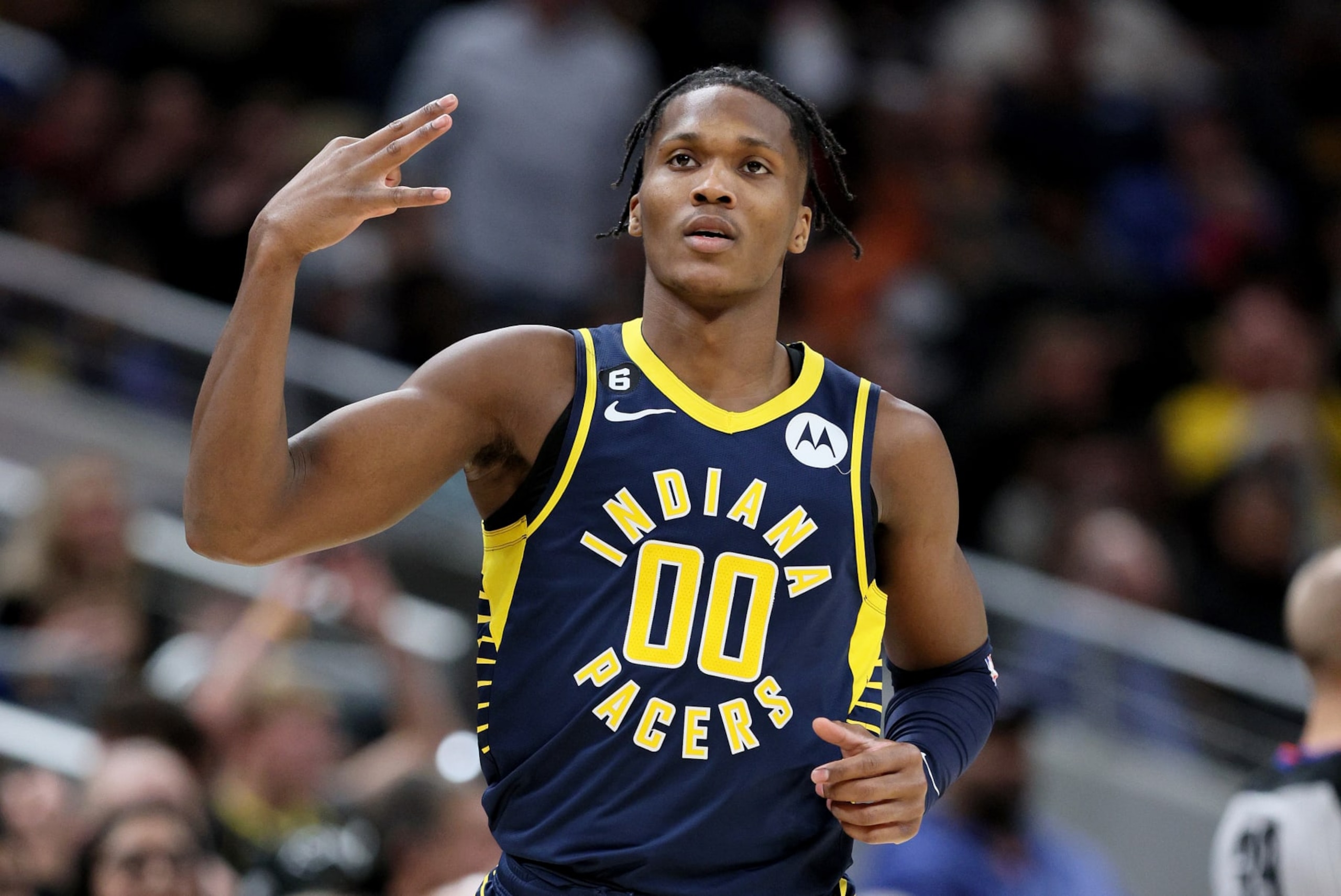 INDIANAPOLIS, INDIANA - DECEMBER 14: Bennedict Mathurin #00 of the Indiana Pacers celebrates after making a three point shot against the Golden State Warriors at Gainbridge Fieldhouse on December 14, 2022 in Indianapolis, Indiana. NOTE TO USER: User expressly acknowledges and agrees that, by downloading and/or using this photograph, User is consenting to the terms and conditions of the Getty Images License Agreement. (Photo by Andy Lyons/Getty Images) INDIANAPOLIS, INDIANA - DECEMBER 14: Bennedict Mathurin #00 of the Indiana Pacers celebrates after making a three point shot against the Golden State Warriors at Gainbridge Fieldhouse on December 14, 2022 in Indianapolis, Indiana. NOTE TO USER: User expressly acknowledges and agrees that, by downloading and/or using this photograph, User is consenting to the terms and conditions of the Getty Images License Agreement. (Photo by Andy Lyons/Getty Images)