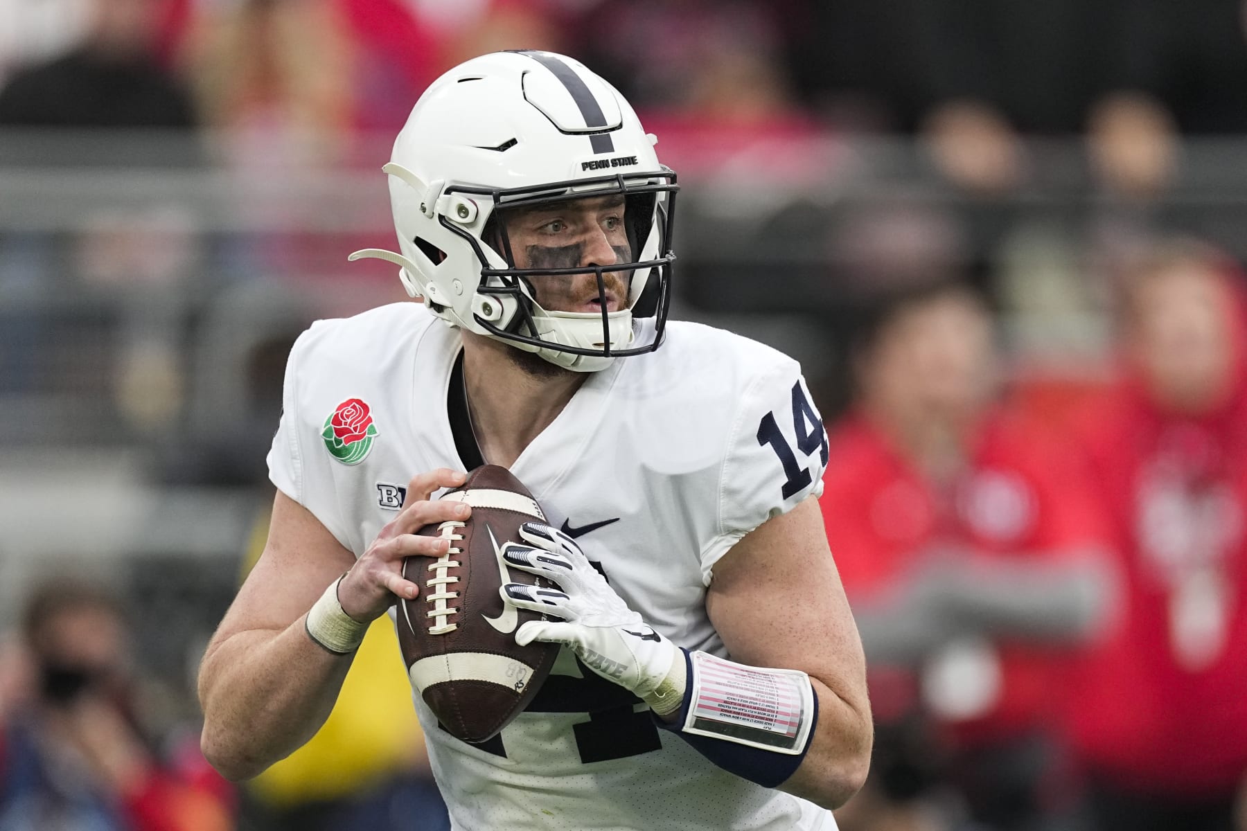 Penn State quarterback Sean Clifford (14) sets up to throw a pass during the first half in the Rose Bowl NCAA college football game against Utah Monday, Jan. 2, 2023, in Pasadena, Calif. (AP Photo/Mark J. Terrill)