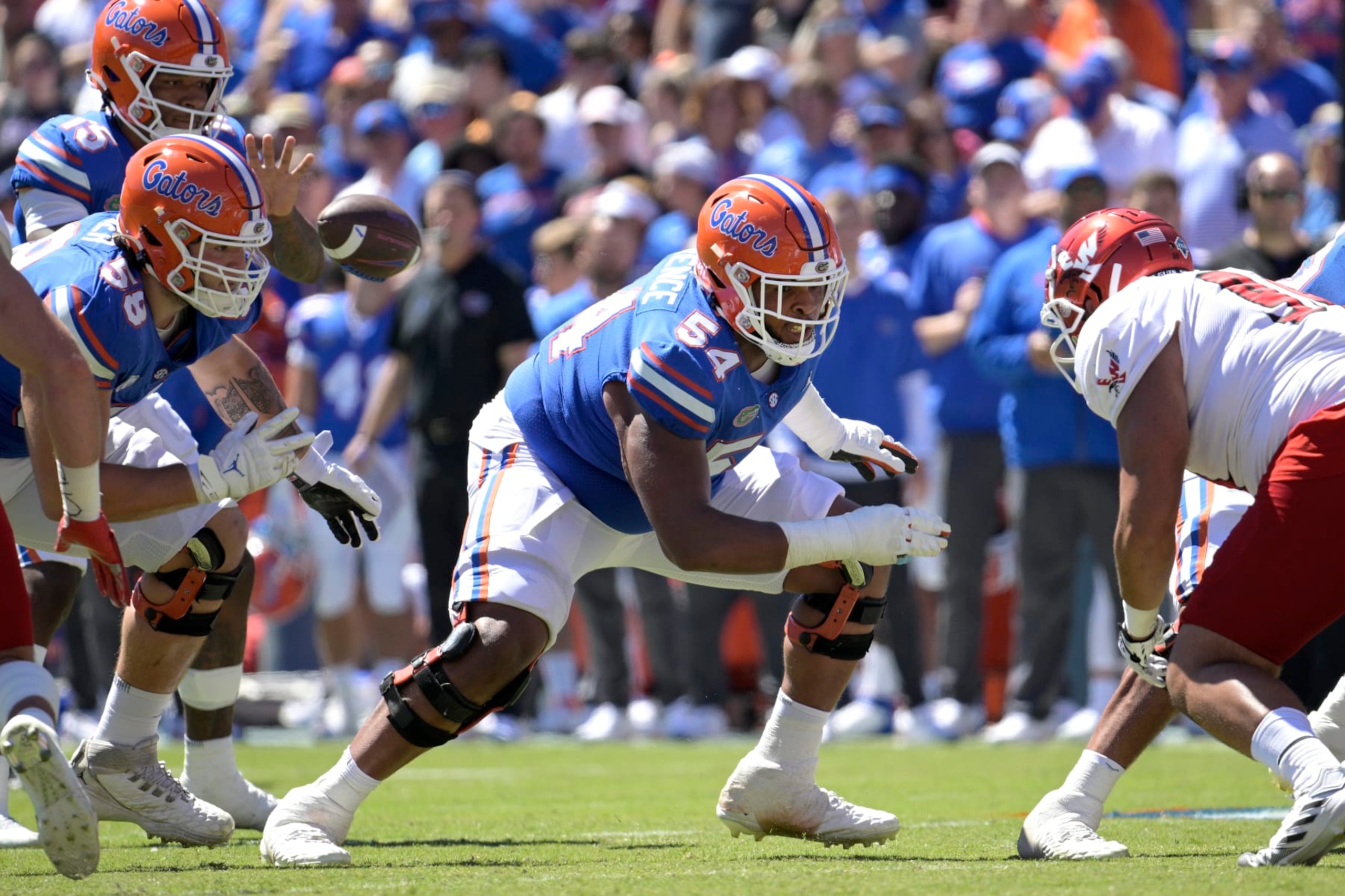 Florida offensive lineman O'Cyrus Torrence (54) sets up to block during the first half of an NCAA college football game against Eastern Washington, Sunday, Oct. 2, 2022, in Gainesville, Fla. (AP Photo/Phelan M. Ebenhack) Florida offensive lineman O'Cyrus Torrence (54) sets up to block during the first half of an NCAA college football game against Eastern Washington, Sunday, Oct. 2, 2022, in Gainesville, Fla. (AP Photo/Phelan M. Ebenhack)