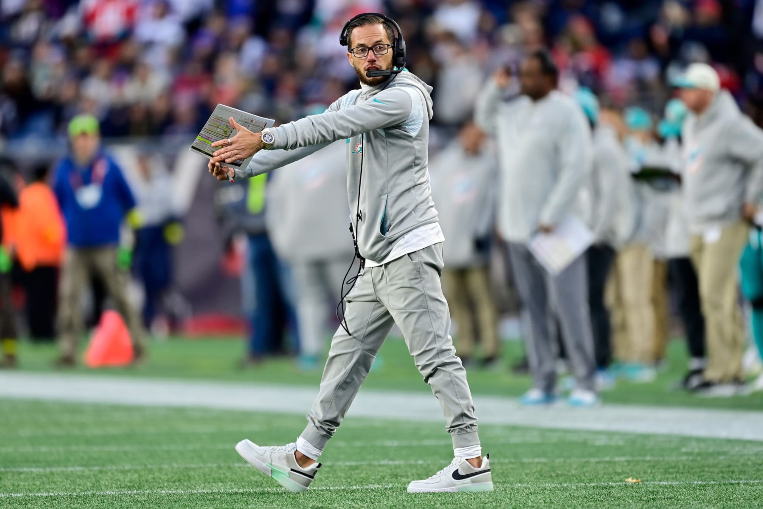 FOXBOROUGH, MASSACHUSETTS - JANUARY 01: Head coach Mike McDaniel of the Miami Dolphins reacts against the New England Patriots during the fourth quarter at Gillette Stadium on January 01, 2023 in Foxborough, Massachusetts. (Photo by Billie Weiss/Getty Images)