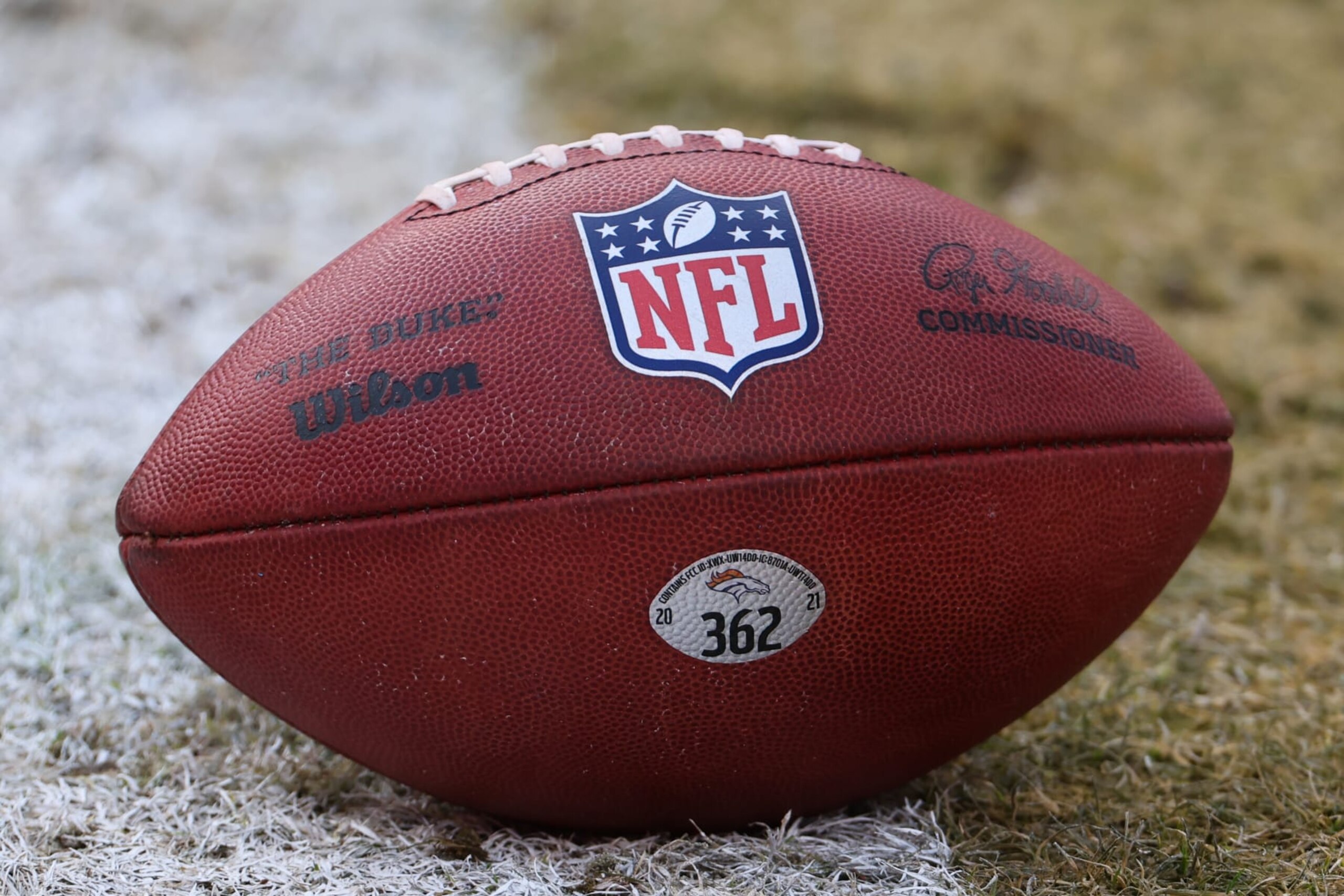 KANSAS CITY, MO - JANUARY 01: A view of the NFL logo on a football before an AFC West game between the Denver Broncos and Kansas City Chiefs on January 1, 2023 at GEHA Field at.Arrowhead Stadium in Kansas City, MO. (Photo by Scott Winters/Icon Sportswire via Getty Images) KANSAS CITY, MO - JANUARY 01: A view of the NFL logo on a football before an AFC West game between the Denver Broncos and Kansas City Chiefs on January 1, 2023 at GEHA Field at.Arrowhead Stadium in Kansas City, MO. (Photo by Scott Winters/Icon Sportswire via Getty Images)