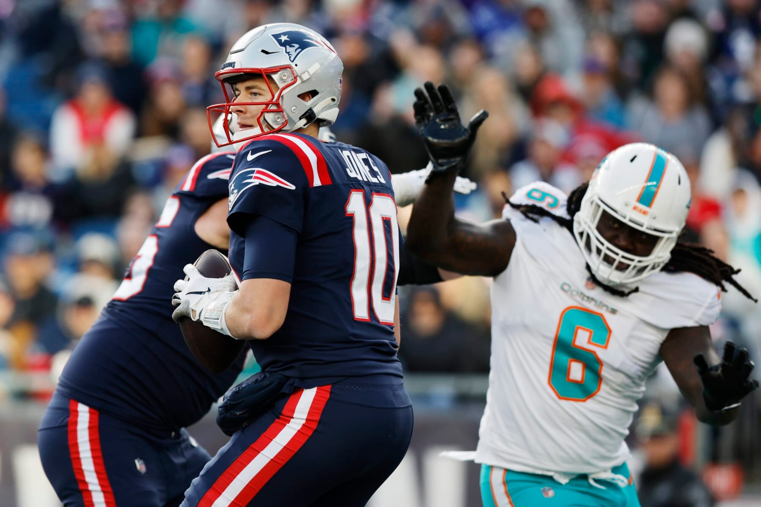 New England Patriots quarterback Mac Jones (10) during the second half of an NFL football game, Sunday, Jan. 1, 2023, in Foxborough, Mass. (AP Photo/Michael Dwyer) New England Patriots quarterback Mac Jones (10) during the second half of an NFL football game, Sunday, Jan. 1, 2023, in Foxborough, Mass. (AP Photo/Michael Dwyer)
