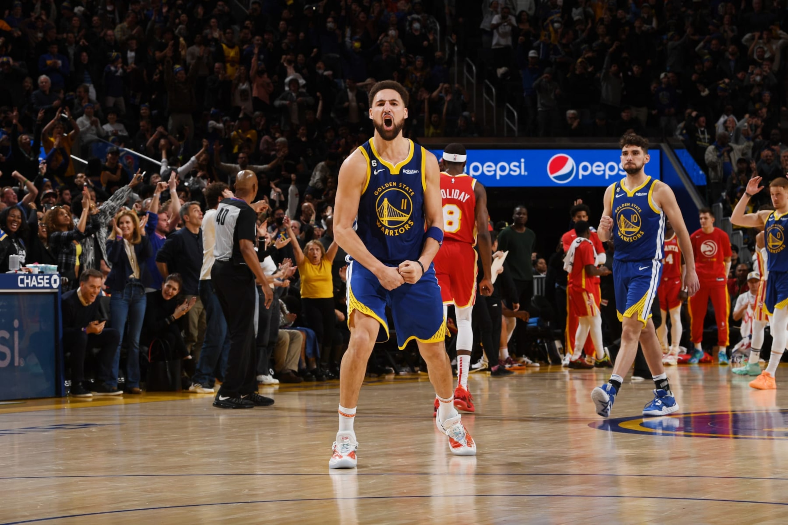 SAN FRANCISCO, CA - JANUARY 2: Klay Thompson #11 of the Golden State Warriors celebrates during the game against the Atlanta Hawks on January 2, 2023 at Chase Center in San Francisco, California. NOTE TO USER: User expressly acknowledges and agrees that, by downloading and or using this photograph, user is consenting to the terms and conditions of Getty Images License Agreement. Mandatory Copyright Notice: Copyright 2023 NBAE (Photo by Noah Graham/NBAE via Getty Images)