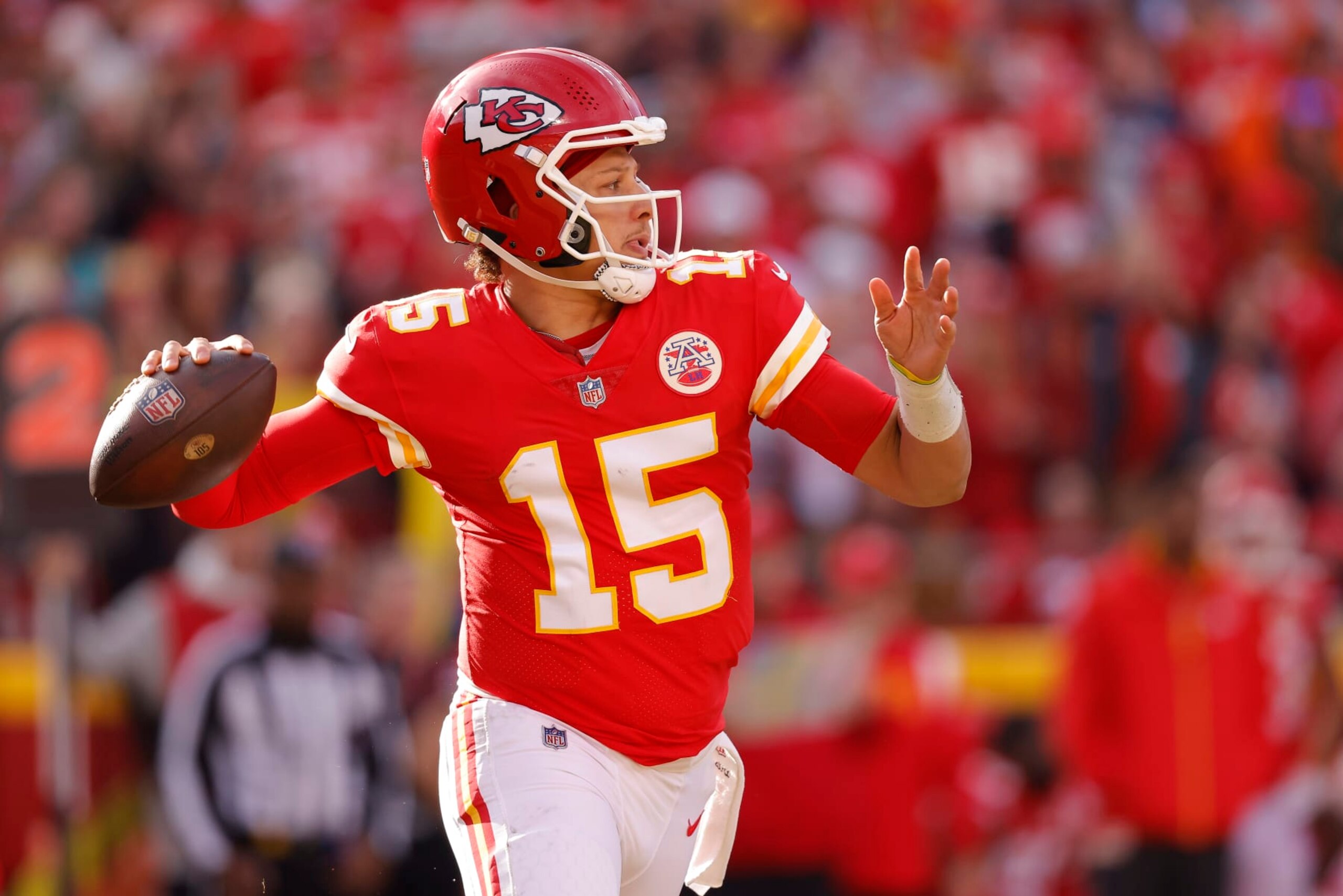 KANSAS CITY, MISSOURI - JANUARY 01: Patrick Mahomes #15 of the Kansas City Chiefs throws the ball during the second half in the game against the Denver Broncos at Arrowhead Stadium on January 01, 2023 in Kansas City, Missouri. (Photo by David Eulitt/Getty Images)