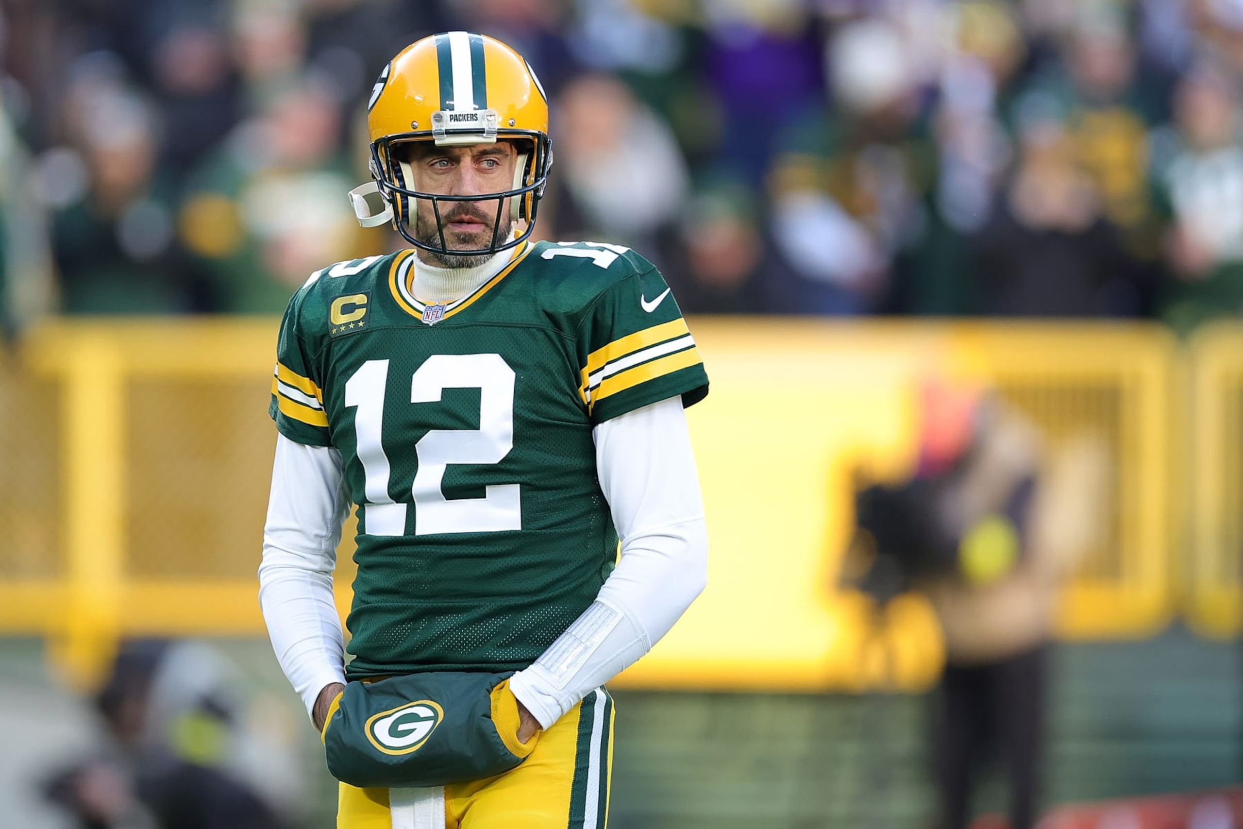 GREEN BAY, WISCONSIN - JANUARY 01: Aaron Rodgers #12 of the Green Bay Packers waits for a timeout during a game against the Minnesota Vikings at Lambeau Field on January 01, 2023 in Green Bay, Wisconsin. The Packers defeated the Vikings 41-17. (Photo by Stacy Revere/Getty Images) GREEN BAY, WISCONSIN - JANUARY 01: Aaron Rodgers #12 of the Green Bay Packers waits for a timeout during a game against the Minnesota Vikings at Lambeau Field on January 01, 2023 in Green Bay, Wisconsin. The Packers defeated the Vikings 41-17. (Photo by Stacy Revere/Getty Images)