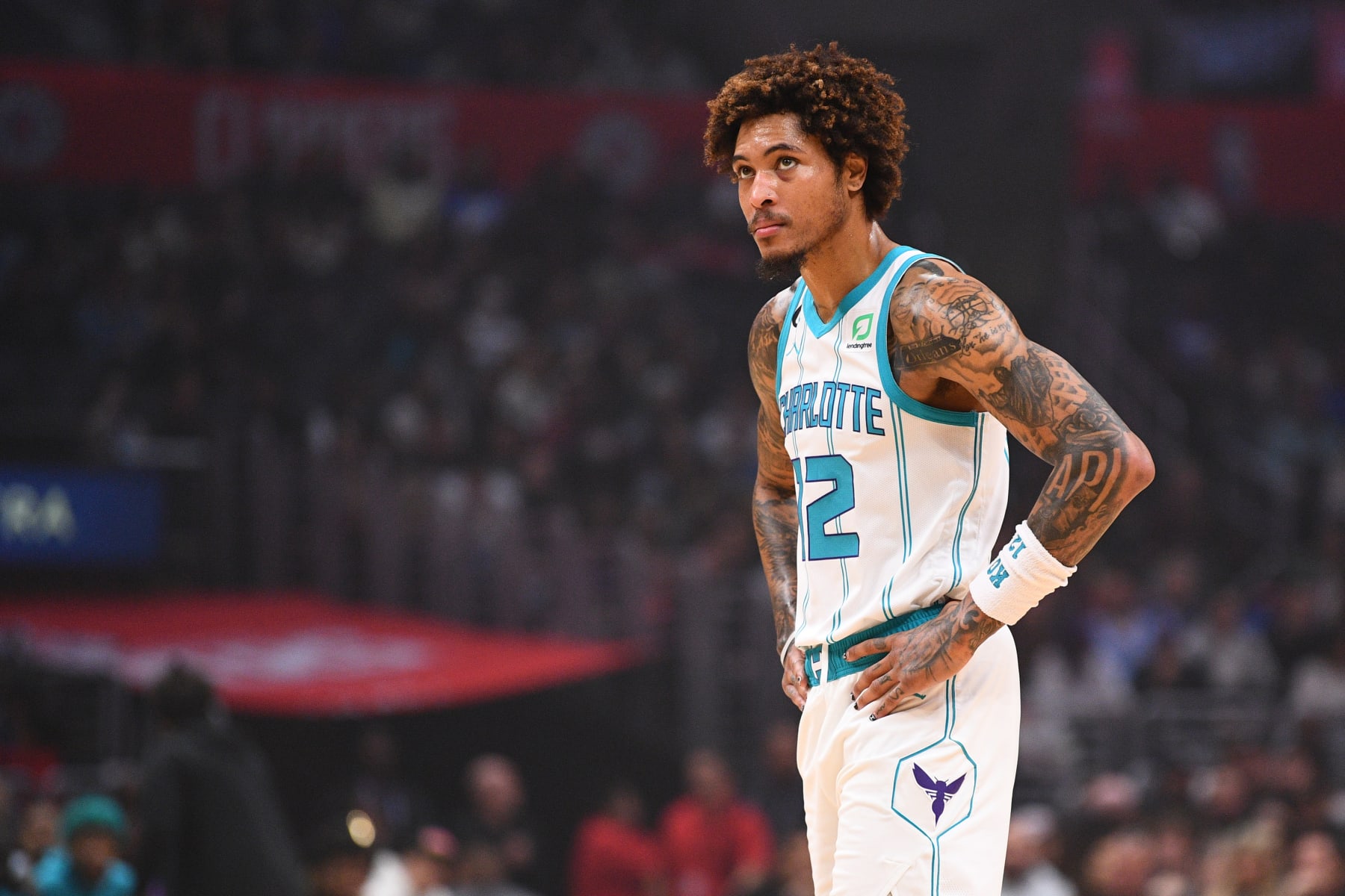 LOS ANGELES, CA - DECEMBER 21: Charlotte Hornets Guard Kelly Oubre Jr. (12) looks on during a NBA game between the Charlotte Hornets and the Los Angeles Clippers on December 21, 2022 at Crypto.com Arena in Los Angeles, CA. (Photo by Brian Rothmuller/Icon Sportswire via Getty Images)