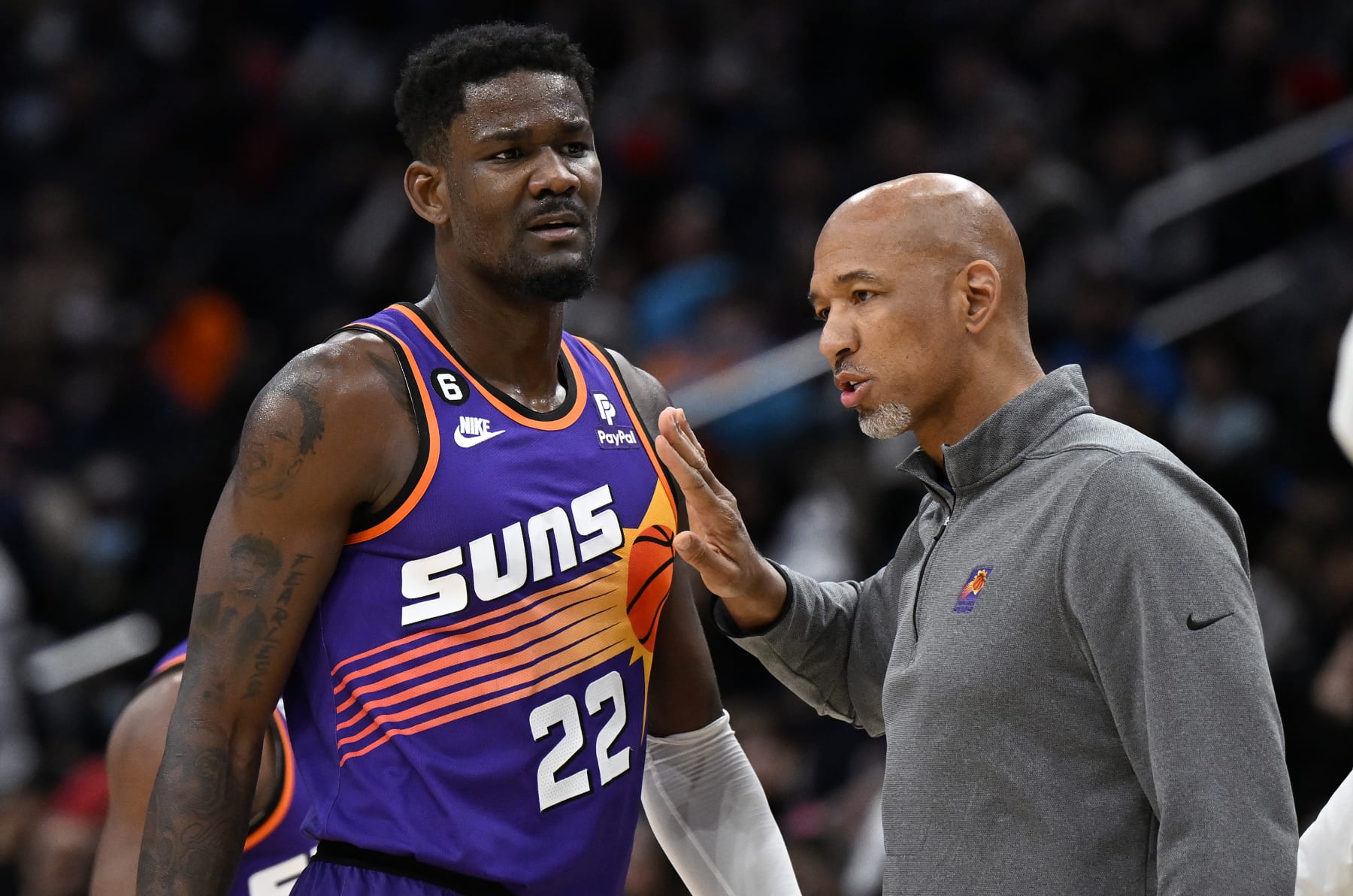 WASHINGTON, DC - DECEMBER 28: Head coach Monty Williams of the Phoenix Suns talks with Deandre Ayton #22 in the third quarter against the Washington Wizards at Capital One Arena on December 28, 2022 in Washington, DC. NOTE TO USER: User expressly acknowledges and agrees that, by downloading and or using this photograph, User is consenting to the terms and conditions of the Getty Images License Agreement.  (Photo by G Fiume/Getty Images)