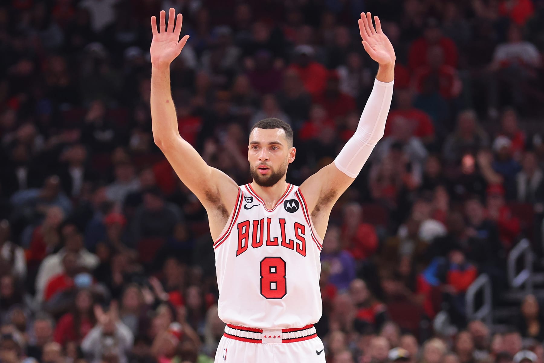 CHICAGO, ILLINOIS - DECEMBER 31: Zach LaVine #8 of the Chicago Bulls celebrates a basket against the Cleveland Cavaliers during the first half at United Center on December 31, 2022 in Chicago, Illinois. NOTE TO USER: User expressly acknowledges and agrees that, by downloading and or using this photograph, User is consenting to the terms and conditions of the Getty Images License Agreement. (Photo by Michael Reaves/Getty Images)