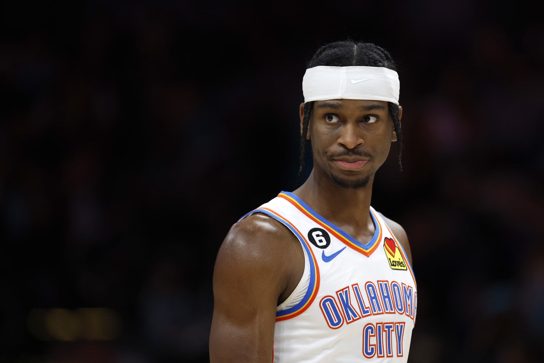 CHARLOTTE, NORTH CAROLINA - DECEMBER 29: Shai Gilgeous-Alexander #2 of the Oklahoma City Thunder reacts during the second half of the game against the Charlotte Hornets at Spectrum Center on December 29, 2022 in Charlotte, North Carolina. NOTE TO USER: User expressly acknowledges and agrees that, by downloading and or using this photograph, User is consenting to the terms and conditions of the Getty Images License Agreement. (Photo by Jared C. Tilton/Getty Images)