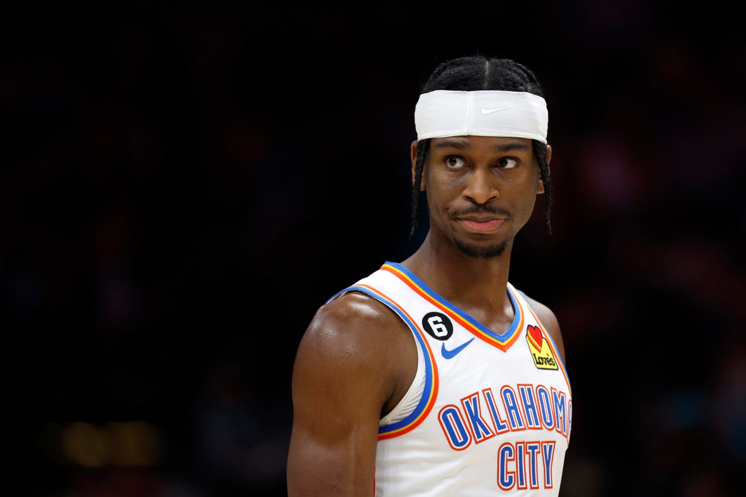 CHARLOTTE, NORTH CAROLINA - DECEMBER 29: Shai Gilgeous-Alexander #2 of the Oklahoma City Thunder reacts during the second half of the game against the Charlotte Hornets at Spectrum Center on December 29, 2022 in Charlotte, North Carolina. NOTE TO USER: User expressly acknowledges and agrees that, by downloading and or using this photograph, User is consenting to the terms and conditions of the Getty Images License Agreement. (Photo by Jared C. Tilton/Getty Images) CHARLOTTE, NORTH CAROLINA - DECEMBER 29: Shai Gilgeous-Alexander #2 of the Oklahoma City Thunder reacts during the second half of the game against the Charlotte Hornets at Spectrum Center on December 29, 2022 in Charlotte, North Carolina. NOTE TO USER: User expressly acknowledges and agrees that, by downloading and or using this photograph, User is consenting to the terms and conditions of the Getty Images License Agreement. (Photo by Jared C. Tilton/Getty Images)