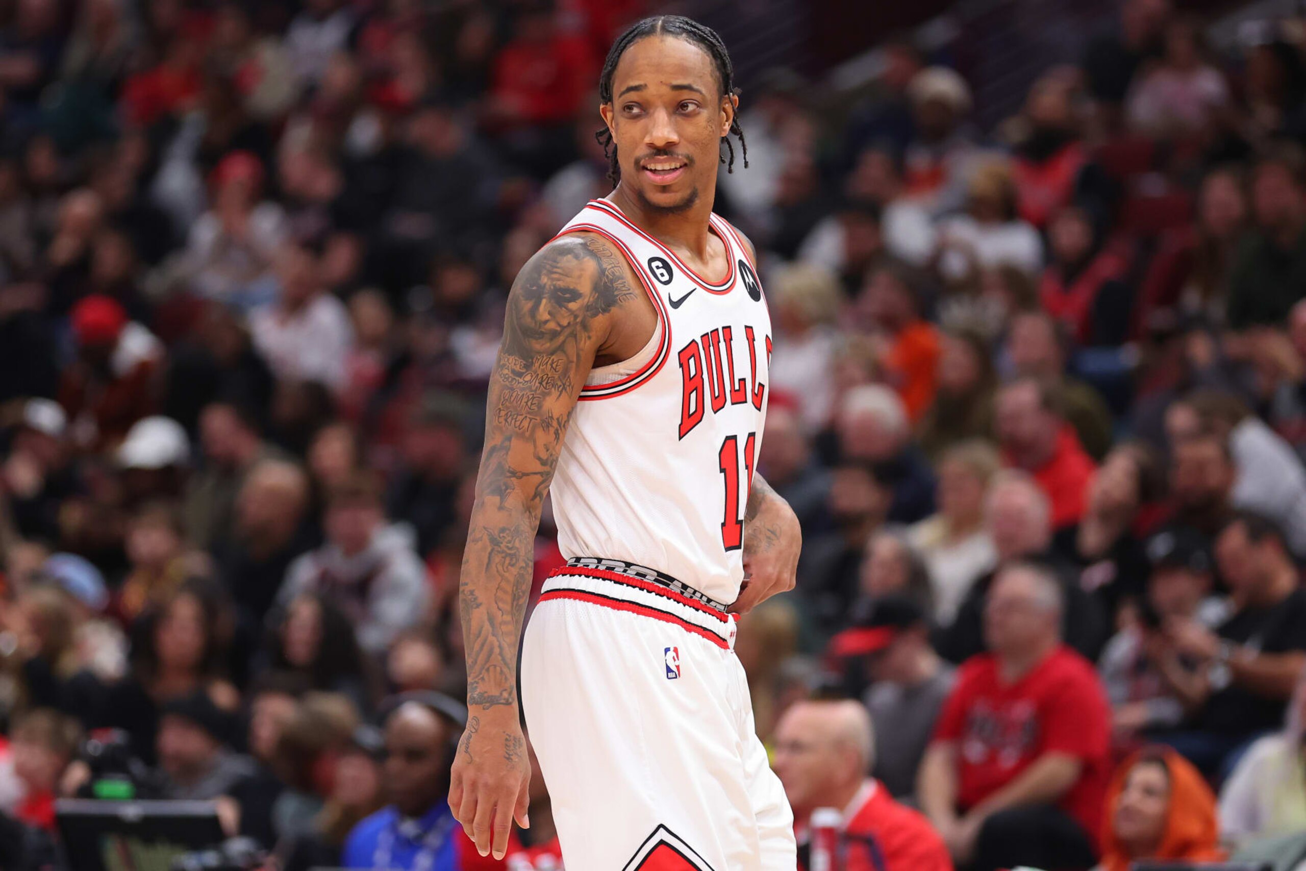 CHICAGO, ILLINOIS - DECEMBER 31: DeMar DeRozan #11 of the Chicago Bulls looks on prior to the game against the Cleveland Cavaliers during the first half at United Center on December 31, 2022 in Chicago, Illinois. NOTE TO USER: User expressly acknowledges and agrees that, by downloading and or using this photograph, User is consenting to the terms and conditions of the Getty Images License Agreement. (Photo by Michael Reaves/Getty Images) CHICAGO, ILLINOIS - DECEMBER 31: DeMar DeRozan #11 of the Chicago Bulls looks on prior to the game against the Cleveland Cavaliers during the first half at United Center on December 31, 2022 in Chicago, Illinois. NOTE TO USER: User expressly acknowledges and agrees that, by downloading and or using this photograph, User is consenting to the terms and conditions of the Getty Images License Agreement. (Photo by Michael Reaves/Getty Images)