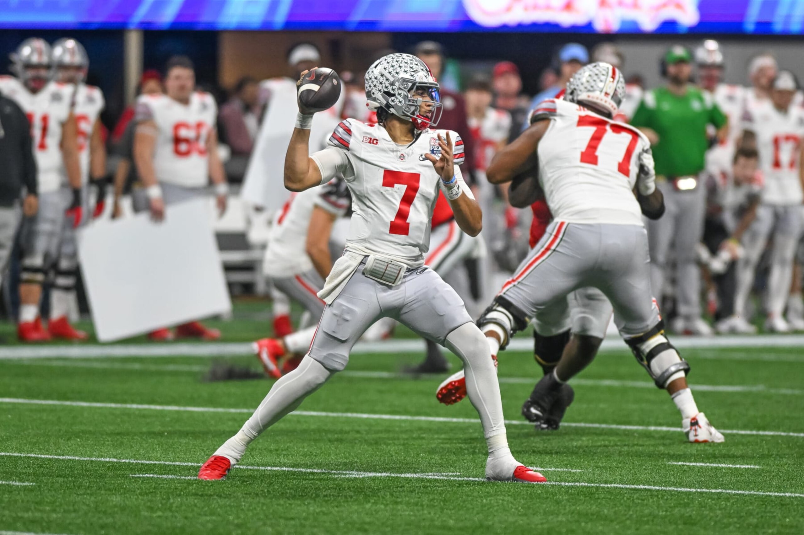 ATLANTA, GA - DECEMBER 31: Ohio State Buckeyes quarterback C.J. Stroud (7) during the Chick-fil-A Peach Bowl College Football Playoff Semifinal game between the Ohio State Buckeyes and the Georgia Bulldogs on December 31, 2022, at Mercedes-Benz Stadium in Atlanta, Georgia.  (Photo by John Adams/Icon Sportswire via Getty Images)