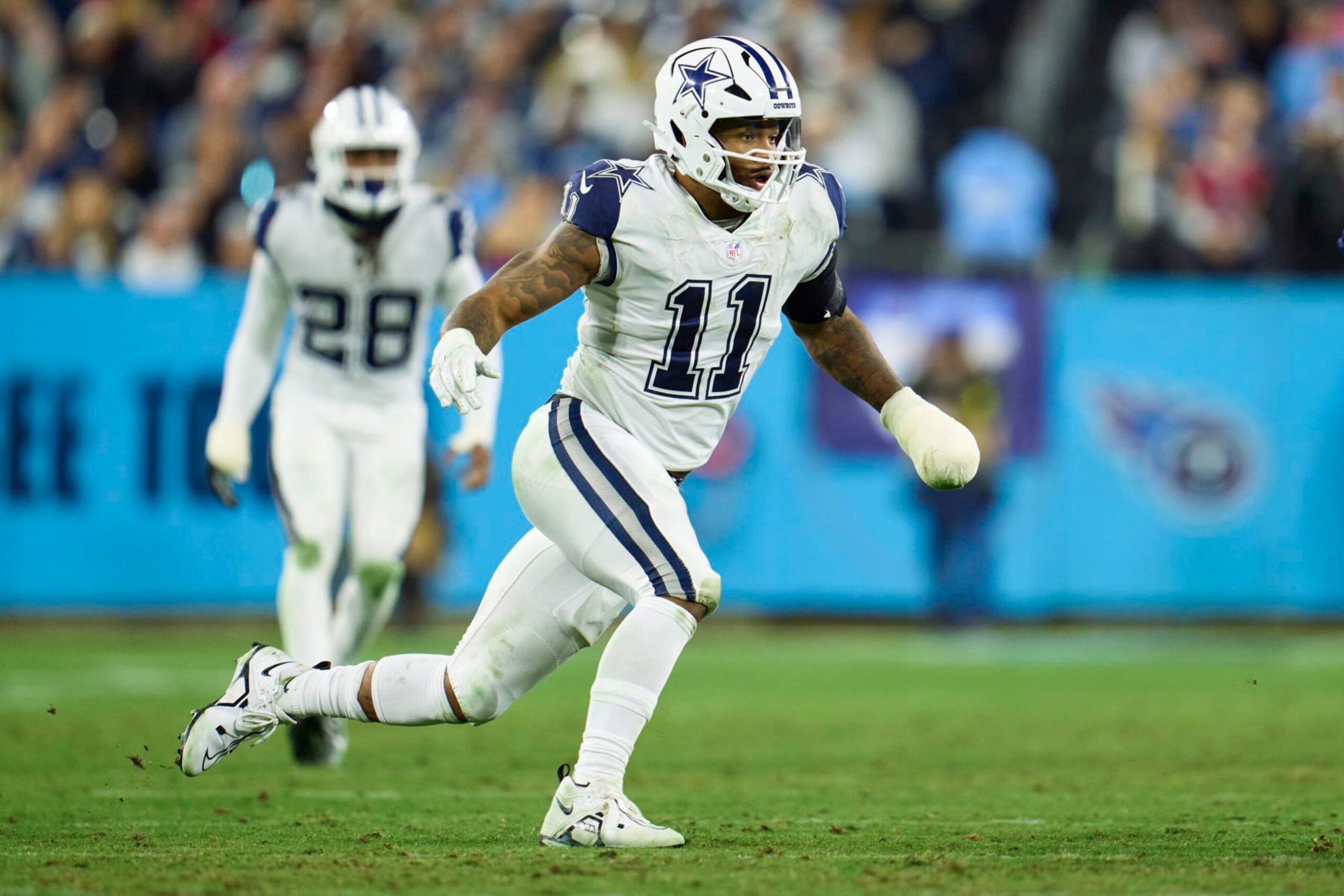 NASHVILLE, TN - DECEMBER 29: Micah Parsons #11 of the Dallas Cowboys defends against the Tennessee Titans during the second half at Nissan Stadium on December 29, 2022 in Nashville, Tennessee. (Photo by Cooper Neill/Getty Images)