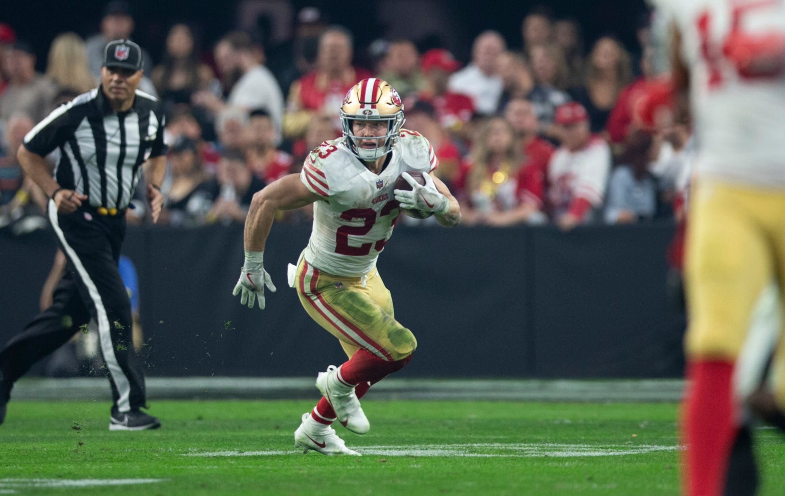 LAS VEGAS, NV - JANUARY 1: Christian McCaffrey #23 of the San Francisco 49ers rushes during the game against the Las Vegas Raiders at Allegiant Stadium on January 1, 2023 in Las Vegas, Nevada. The 49ers defeated the Raiders 37-34. (Photo by Michael Zagaris/San Francisco 49ers/Getty Images)