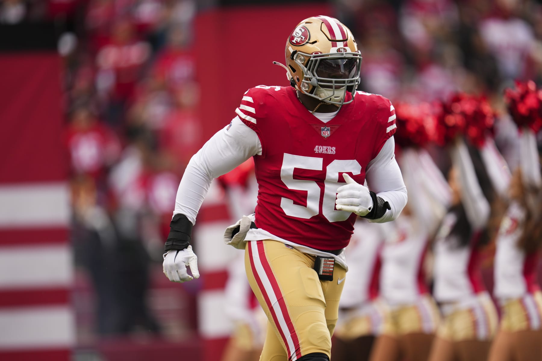 SANTA CLARA, CA - DECEMBER 11: Samson Ebukam #56 of the San Francisco 49ers runs out during introductions against the Tampa Bay Buccaneers at Levi's Stadium on December 11, 2022 in Santa Clara, California. (Photo by Cooper Neill/Getty Images)