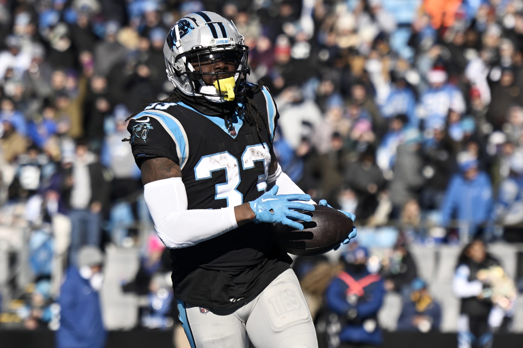 CHARLOTTE, NORTH CAROLINA - DECEMBER 24: D'Onta Foreman #33 of the Carolina Panthers scores a touchdown against the Detroit Lions in the second quarter at Bank of America Stadium on December 24, 2022 in Charlotte, North Carolina. (Photo by Eakin Howard/Getty Images)