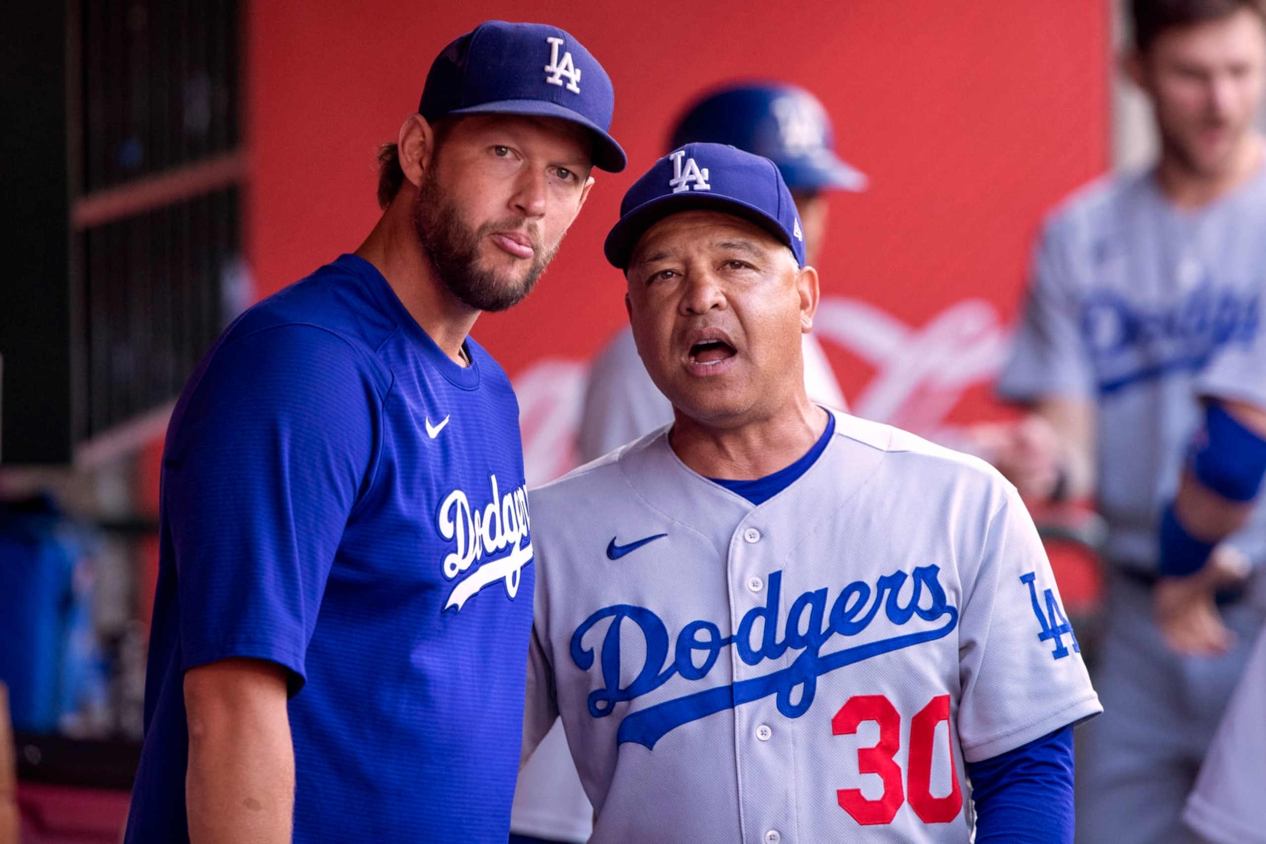 The Dodgers' Clayton Kershaw (left) and Dave Roberts The Dodgers' Clayton Kershaw (left) and Dave Roberts