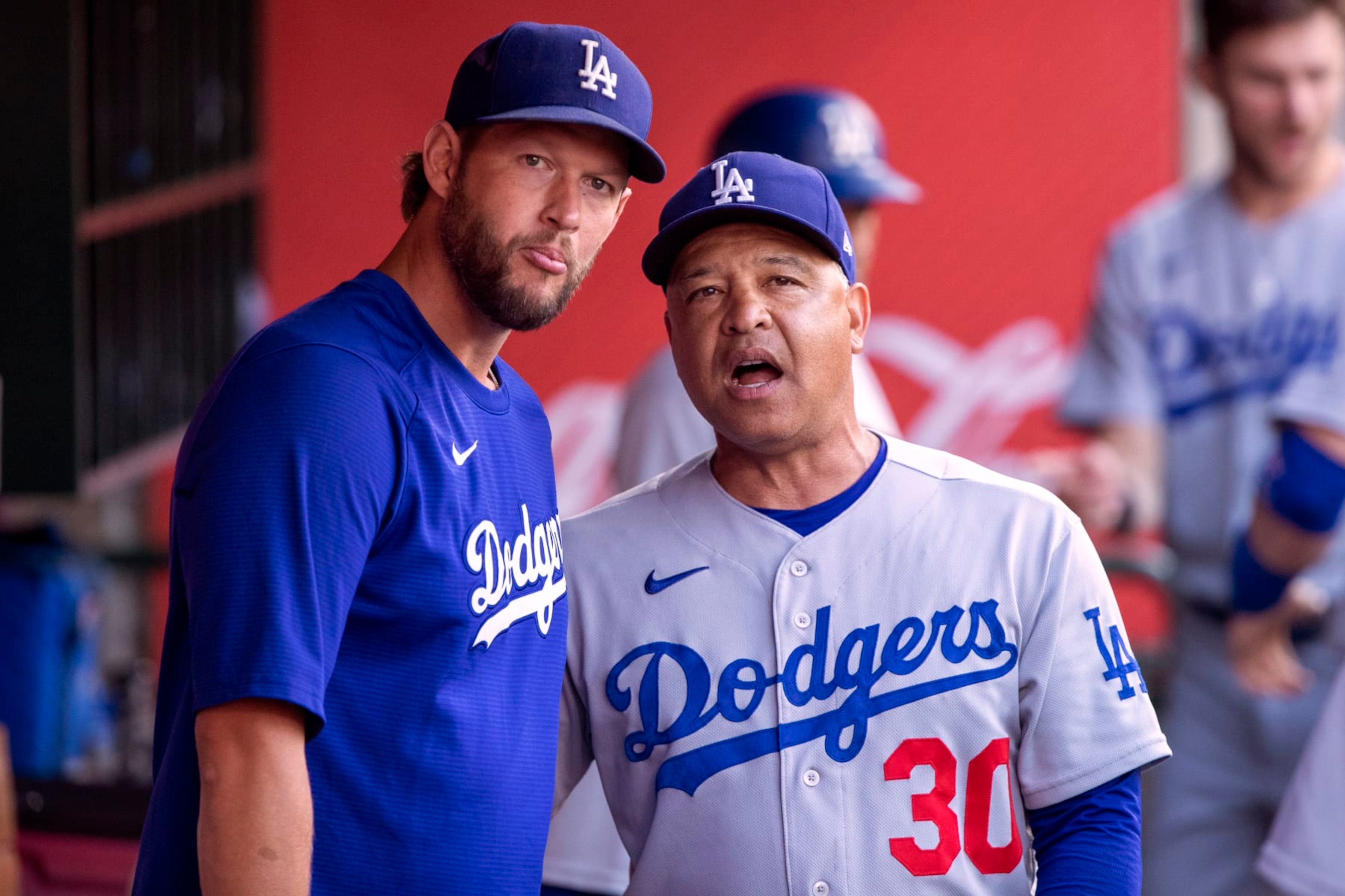 The Dodgers' Clayton Kershaw (left) and Dave Roberts