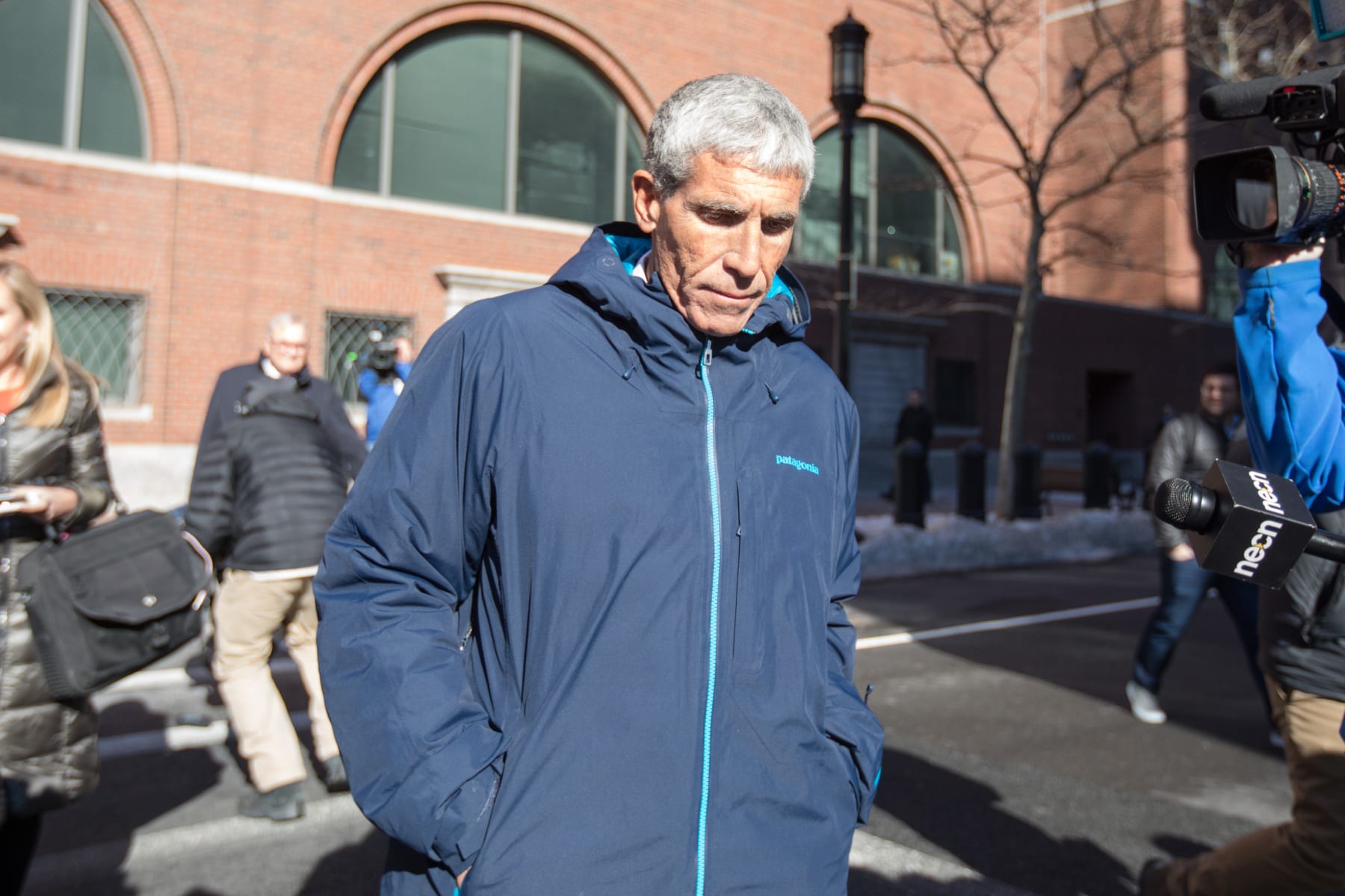 BOSTON, MA - MARCH 12:  William "Rick" Singer leaves Boston Federal Court after being charged with racketeering conspiracy, money laundering conspiracy, conspiracy to defraud the United States, and obstruction of justice on March 12, 2019 in Boston, Massachusetts. Singer is among several charged in alleged college admissions scam.  (Photo by Scott Eisen/Getty Images)