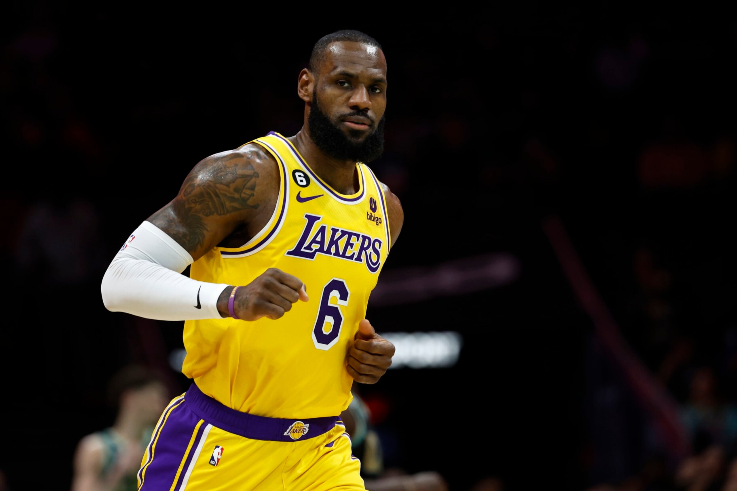 CHARLOTTE, NORTH CAROLINA - JANUARY 02: LeBron James #6 of the Los Angeles Lakers looks on during the first quarter of the game against the Charlotte Hornets at Spectrum Center on January 02, 2023 in Charlotte, North Carolina. NOTE TO USER: User expressly acknowledges and agrees that, by downloading and or using this photograph, User is consenting to the terms and conditions of the Getty Images License Agreement. (Photo by Jared C. Tilton/Getty Images)