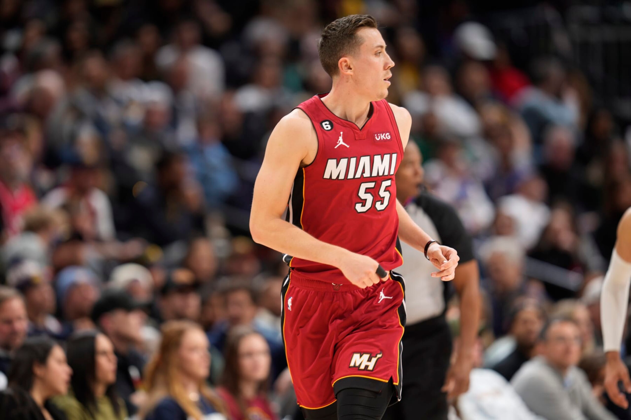 Miami Heat forward Duncan Robinson (55) in the second half of an NBA basketball game Friday, Dec. 30, 2022, in Denver. (AP Photo/David Zalubowski)