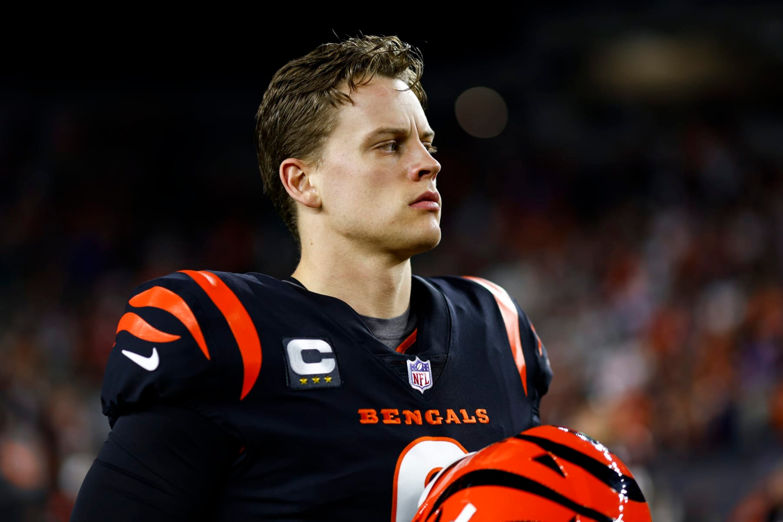 CINCINNATI, OH - JANUARY 2: Joe Burrow #9 of the Cincinnati Bengals stretches prior to an NFL football game against the Buffalo Bills at Paycor Stadium on January 2, 2023 in Cincinnati, Ohio. (Photo by Kevin Sabitus/Getty Images)