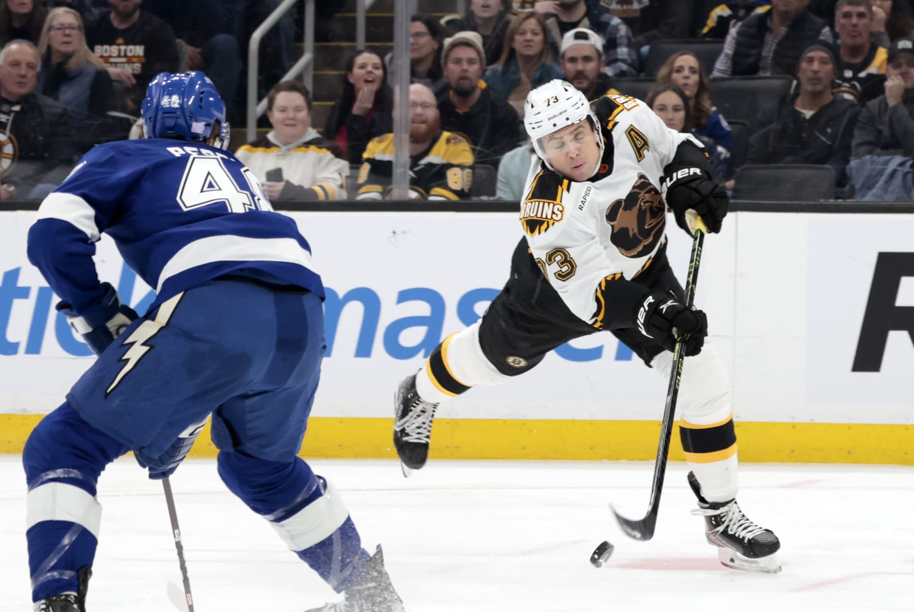 BOSTON, MA - NOVEMBER 29: Boston Bruins right defenseman Charlie McAvoy (73) shoots during a game between the Boston Bruins and the Tampa Bay Lightning on November 29, 2022, at TD Garden in Boston, Massachusetts. (Photo by Fred Kfoury III/Icon Sportswire via Getty Images)