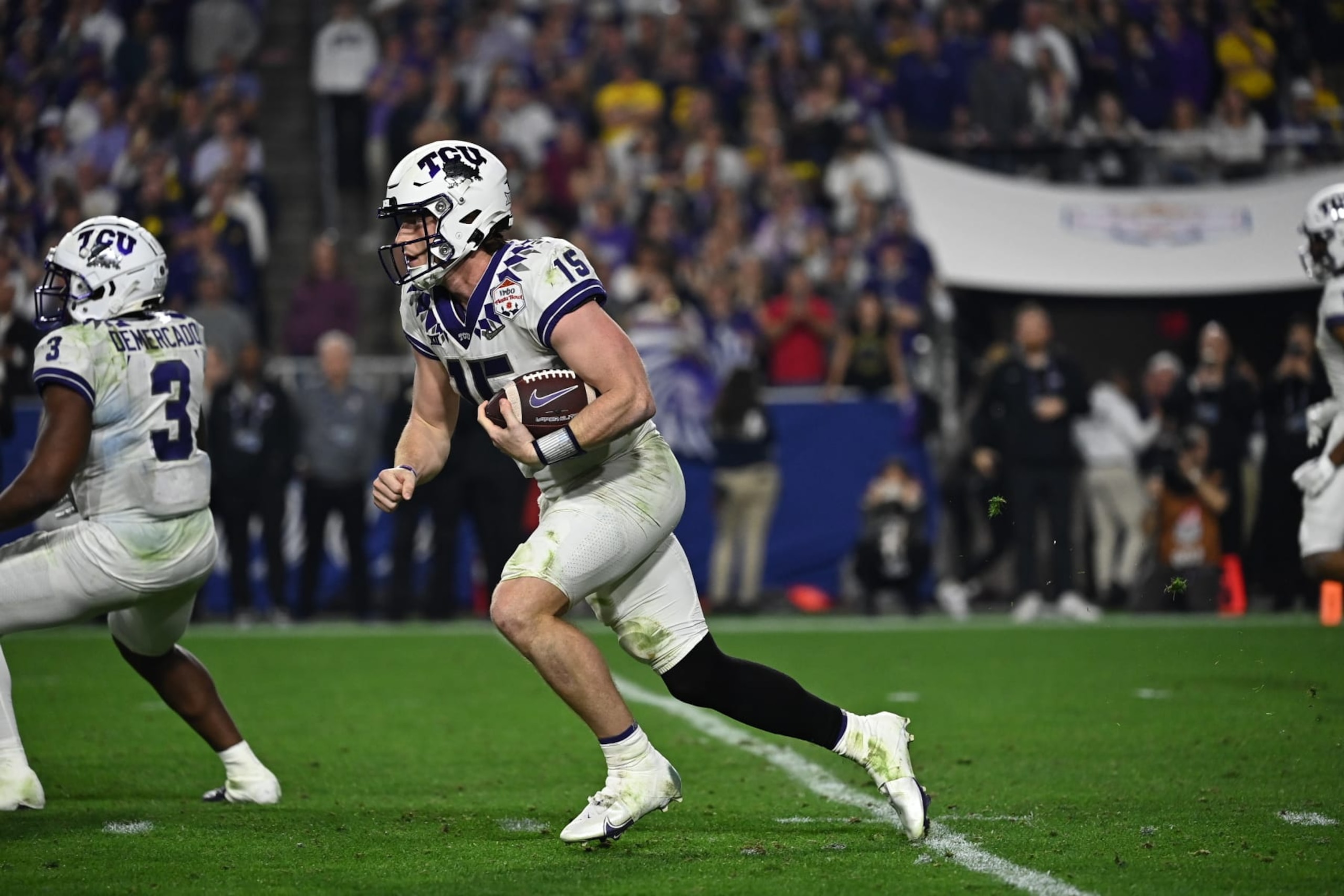 College Football: Fiesta Bowl: TCU Max Duggan (15) in action, runs the football vs Michigan at State Farm Stadium. Glendale, AZ 12/31/2022 CREDIT: John W. McDonough (Photo by John W. McDonough /Sports Illustrated via Getty Images) (Set Number: X164269 TK1) College Football: Fiesta Bowl: TCU Max Duggan (15) in action, runs the football vs Michigan at State Farm Stadium. Glendale, AZ 12/31/2022 CREDIT: John W. McDonough (Photo by John W. McDonough /Sports Illustrated via Getty Images) (Set Number: X164269 TK1)