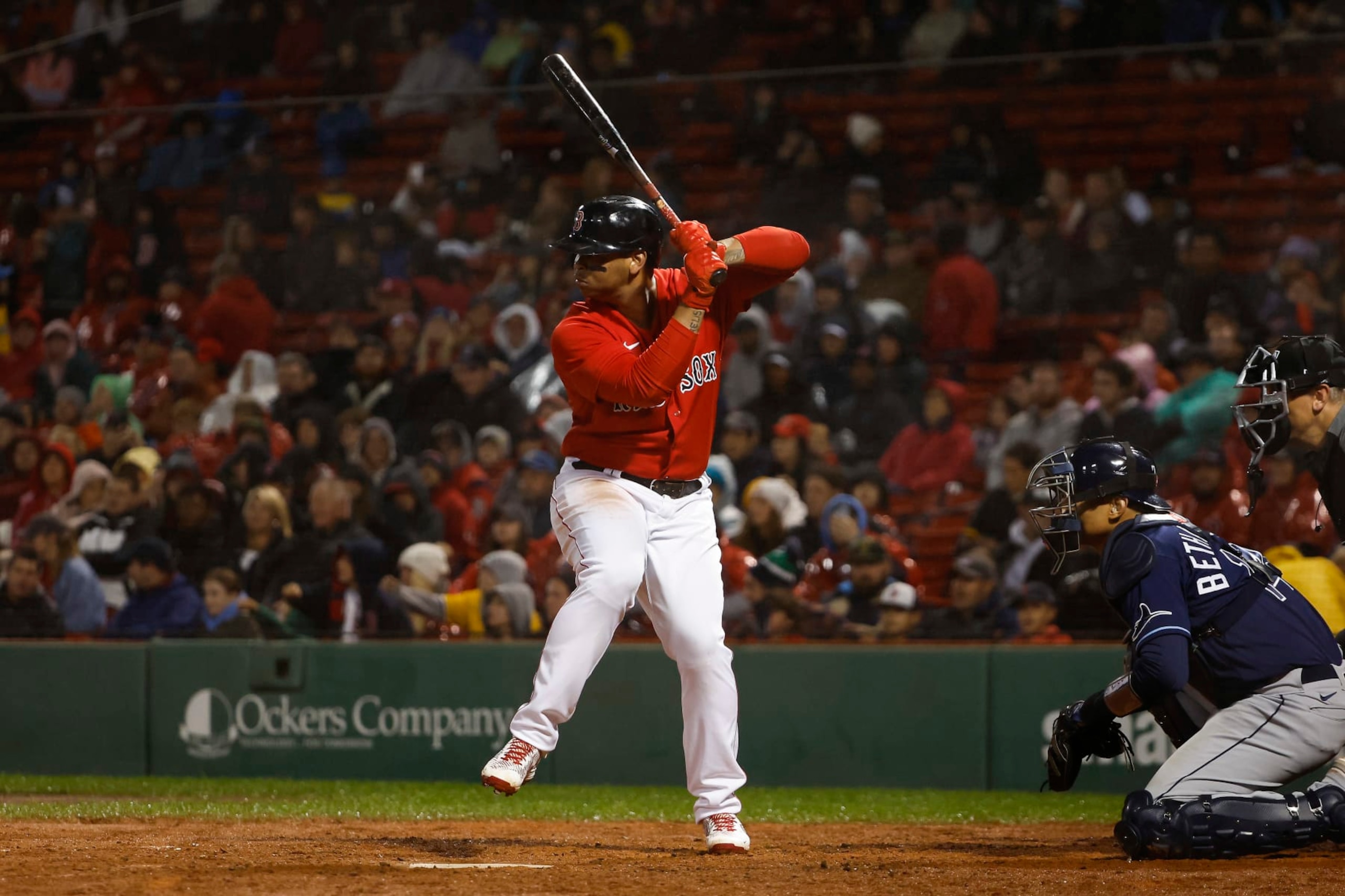 BOSTON, MA - OCTOBER 4: Rafael Devers #11 of the Boston Red Sox at bat against the Tampa Bay Rays during the first inning at Fenway Park on October 4, 2022 in Boston, Massachusetts. (Photo By Winslow Townson/Getty Images)
