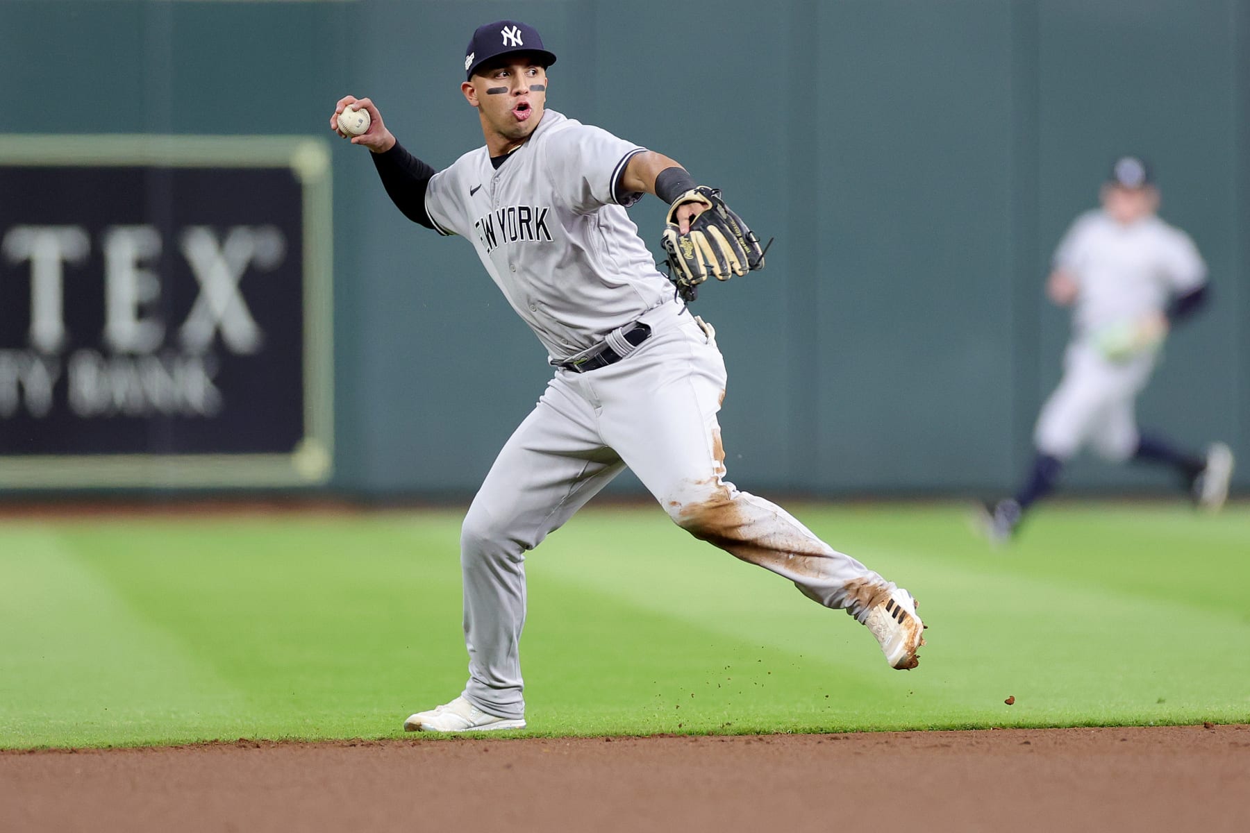 HOUSTON, TEXAS - OCTOBER 20: Oswald Peraza #91 of the New York Yankees throws out Jose Altuve #27 of the Houston Astros during the first inning in game two of the American League Championship Series at Minute Maid Park on October 20, 2022 in Houston, Texas. (Photo by Carmen Mandato/Getty Images)