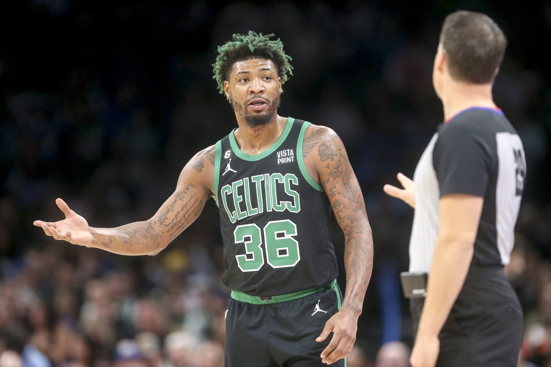 OKLAHOMA CITY, OKLAHOMA - JANUARY 03: Marcus Smart #36 of the Boston Celtics talks to referee Mark Lindsay #29 during the first quarter at Paycom Center on January 03, 2023 in Oklahoma City, Oklahoma. NOTE TO USER: User expressly acknowledges and agrees that, by downloading and or using this photograph, User is consenting to the terms and conditions of the Getty Images License Agreement.  (Photo by Ian Maule/Getty Images)