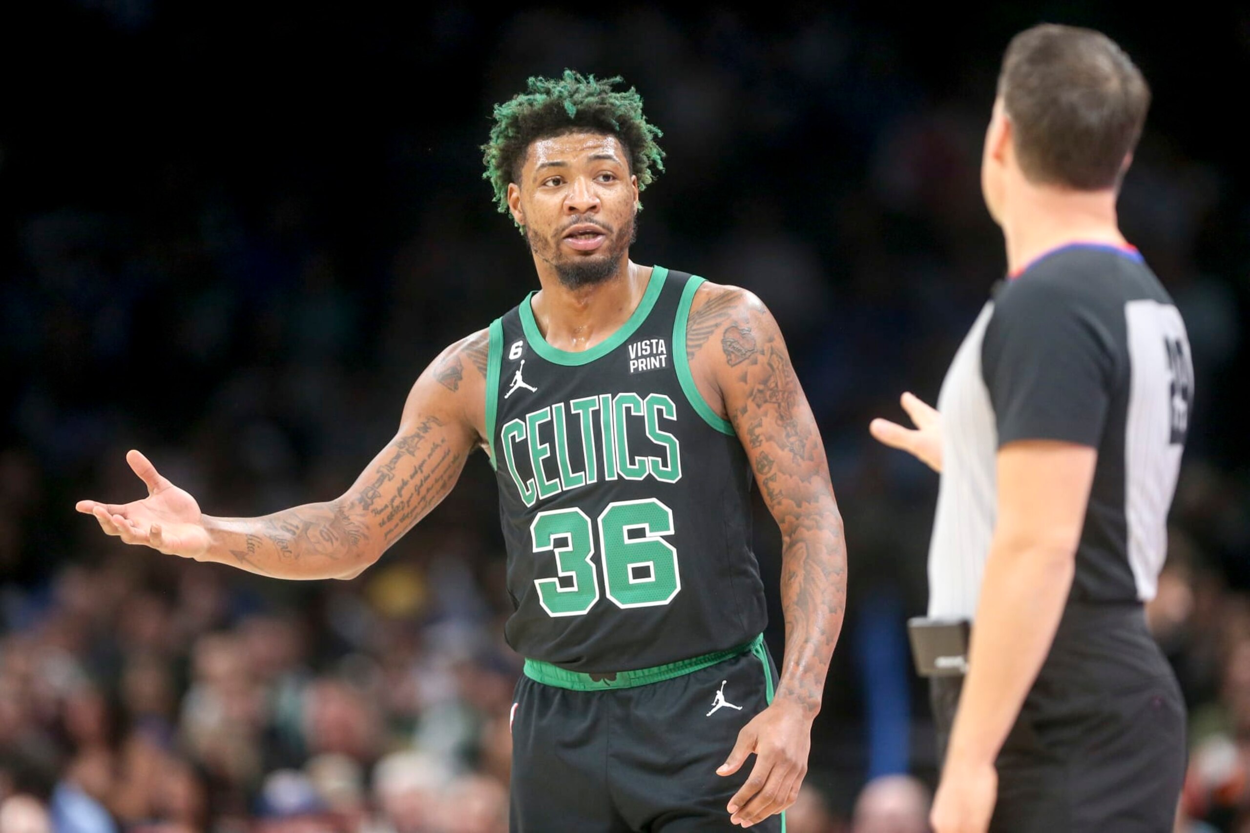 OKLAHOMA CITY, OKLAHOMA - JANUARY 03: Marcus Smart #36 of the Boston Celtics talks to referee Mark Lindsay #29 during the first quarter at Paycom Center on January 03, 2023 in Oklahoma City, Oklahoma. NOTE TO USER: User expressly acknowledges and agrees that, by downloading and or using this photograph, User is consenting to the terms and conditions of the Getty Images License Agreement.  (Photo by Ian Maule/Getty Images)