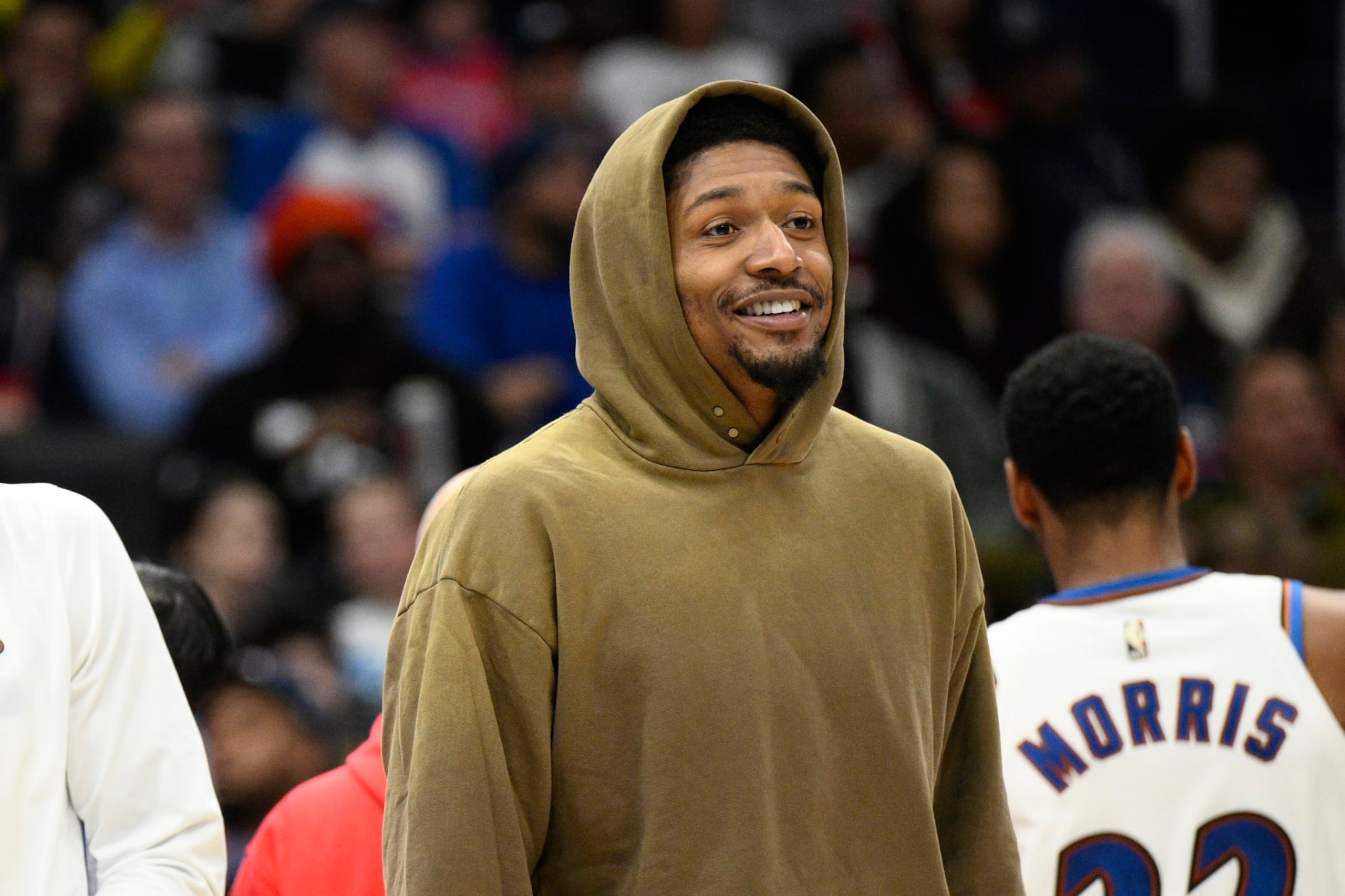 Washington Wizards guard Bradley Beal wears street clothes during a break in the second half of the team's NBA basketball game against the Phoenix Suns, Wednesday, Dec. 28, 2022, in Washington. Beal did not play due to injury. The Wizards won 127-102. (AP Photo/Nick Wass)