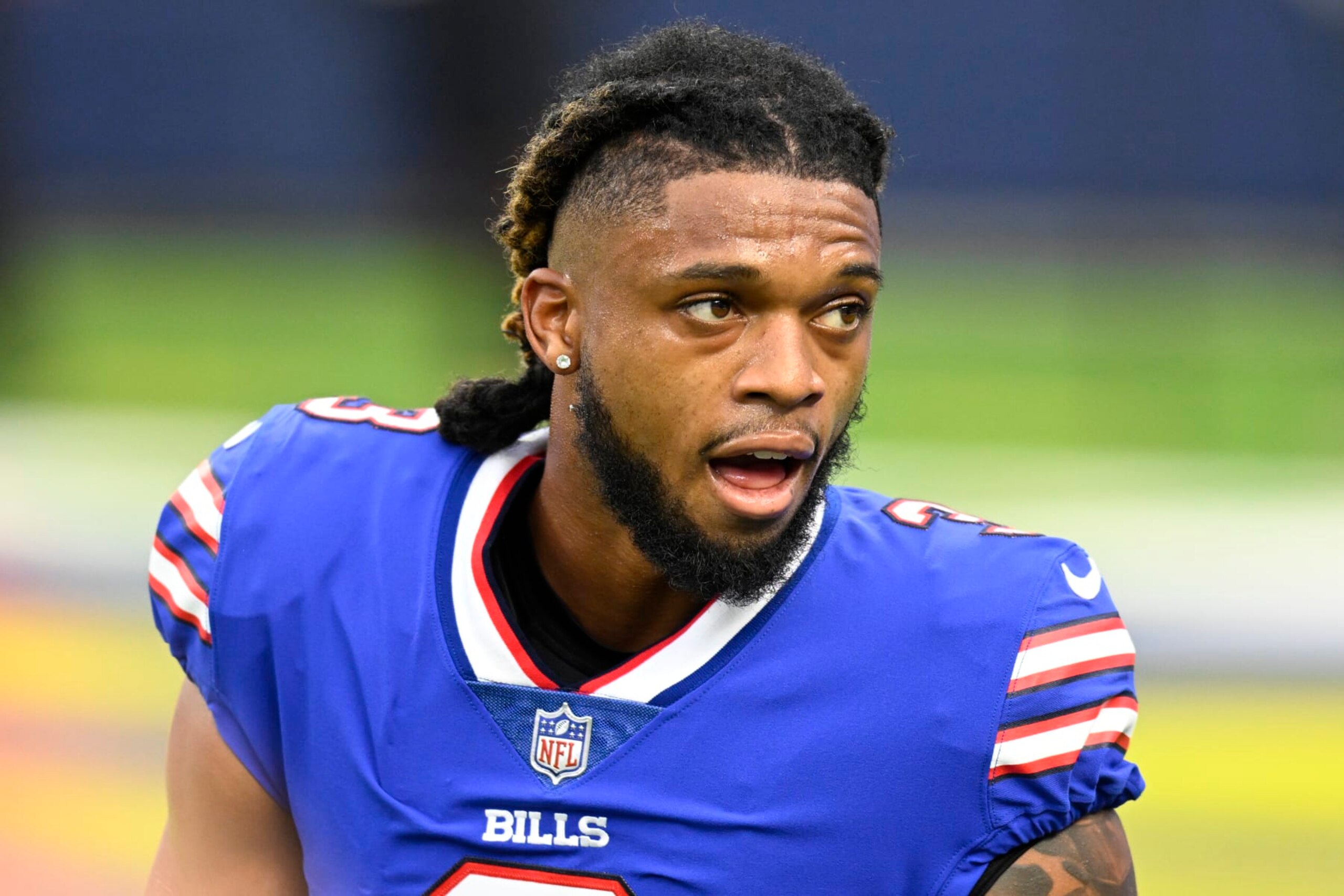 FILE - Buffalo Bills Damar Hamlin with his helmet off before playing the Los Angeles Rams during an NFL football game, Sept. 8, 2021, in Inglewood, Calif. The scenes of Hamlin's on-field collapse after suffering cardiac arrest on Monday, Jan. 2, 2023, has forced some fans to yet again confront a truth they have always known but hated to think about: Football can go from exciting and joyous to dark and tragic in a flash. Now, as the Bills defensive back remains in critical condition in a Cincinnati hospital, fans are reflecting on their relationship with the sport they love. (AP Photo/John McCoy, File) FILE - Buffalo Bills Damar Hamlin with his helmet off before playing the Los Angeles Rams during an NFL football game, Sept. 8, 2021, in Inglewood, Calif. The scenes of Hamlin's on-field collapse after suffering cardiac arrest on Monday, Jan. 2, 2023, has forced some fans to yet again confront a truth they have always known but hated to think about: Football can go from exciting and joyous to dark and tragic in a flash. Now, as the Bills defensive back remains in critical condition in a Cincinnati hospital, fans are reflecting on their relationship with the sport they love. (AP Photo/John McCoy, File)