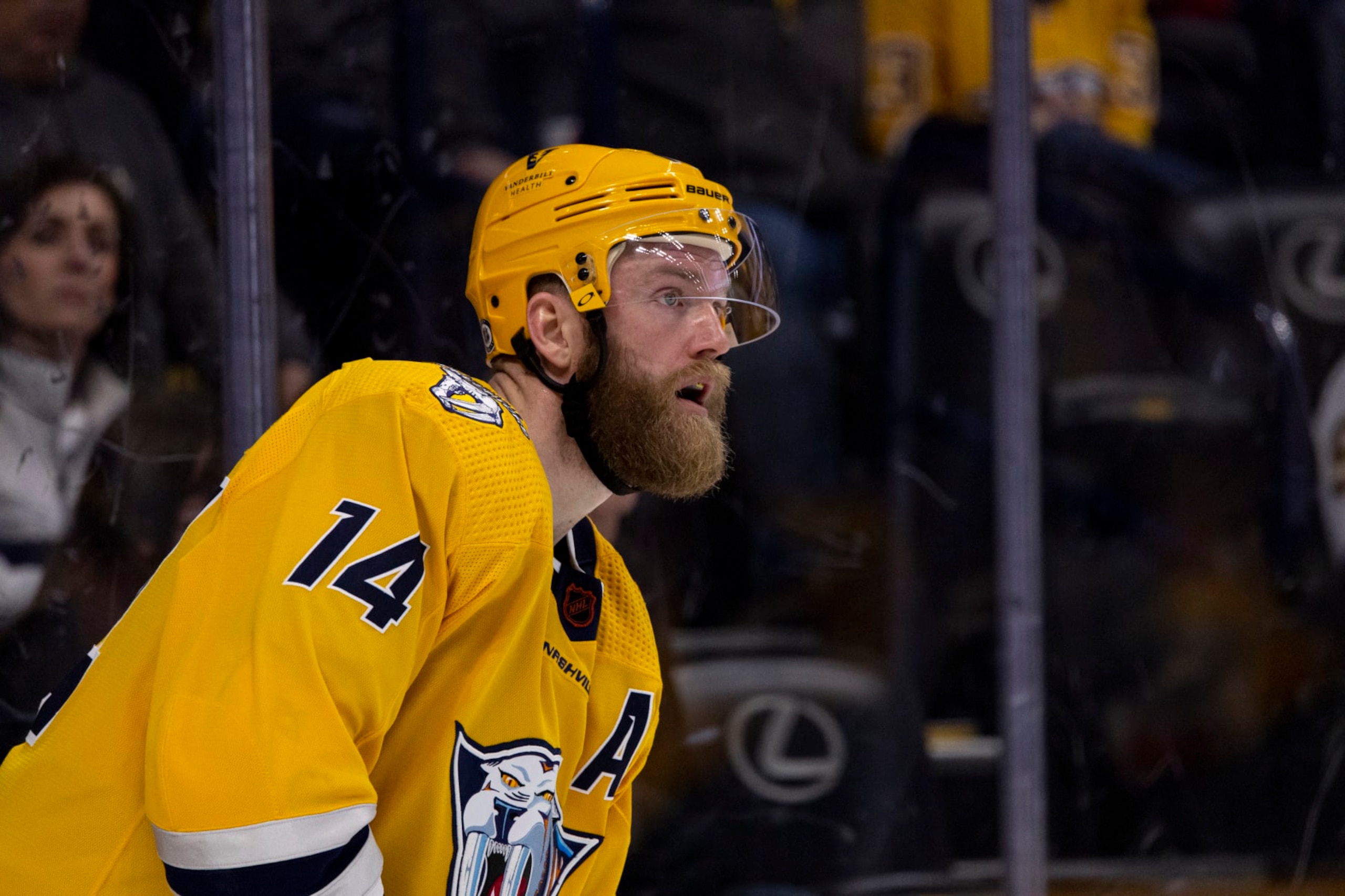 NASHVILLE, TN - DECEMBER 13: Mattias Ekholm #14 of the Nashville Predators surveys the Edmonton Oilers defense from behind his net during the second period at Bridgestone Arena on December 13, 2022 in Nashville, Tennessee. Edmonton defeats Nashville 6-3. (Photo by Brett Carlsen/Getty Images)