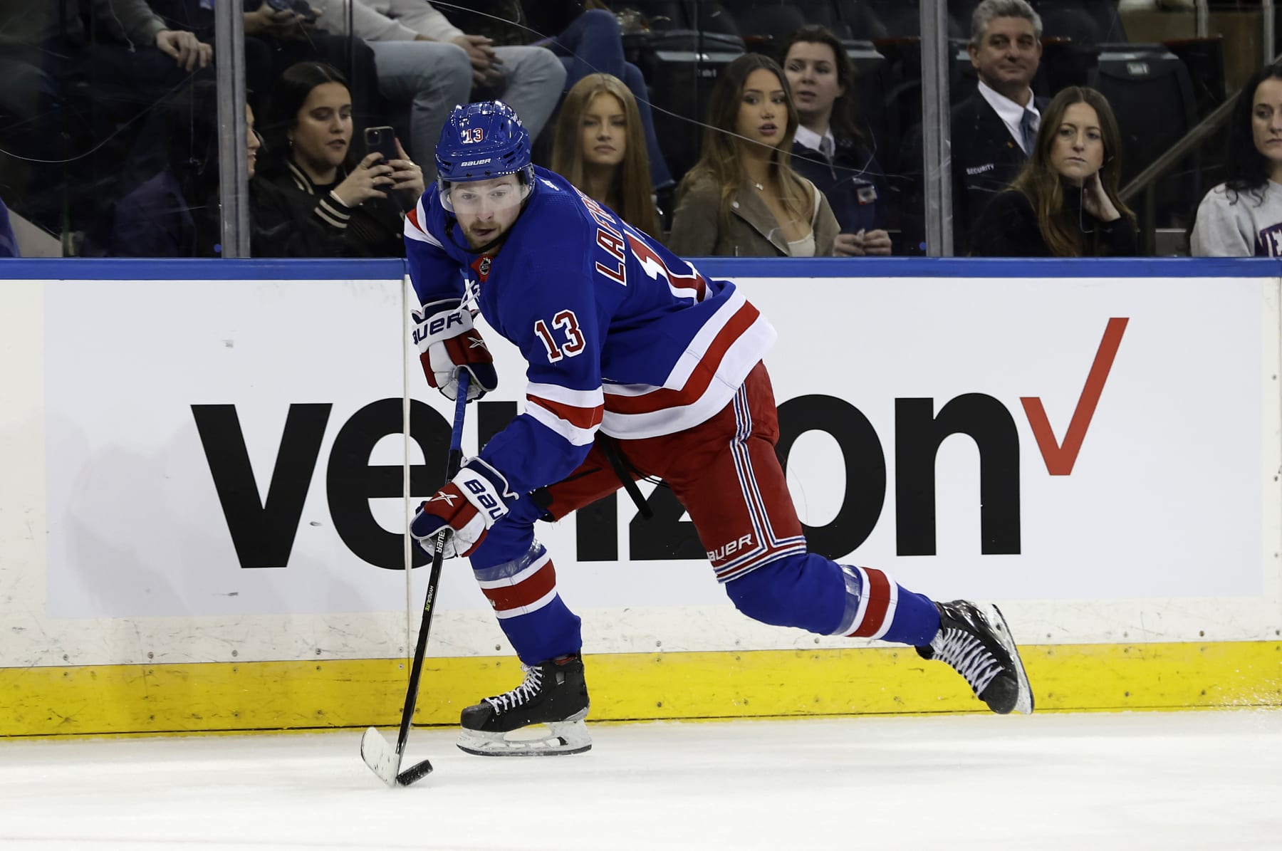 NEW YORK, NEW YORK - DECEMBER 02:  Alexis Lafreniere #13 of the New York Rangers in action against the Ottawa Senators at Madison Square Garden on December 02, 2022 in New York City. The Senators defeated the Rangers 3-2 in overtime. (Photo by Jim McIsaac/Getty Images)