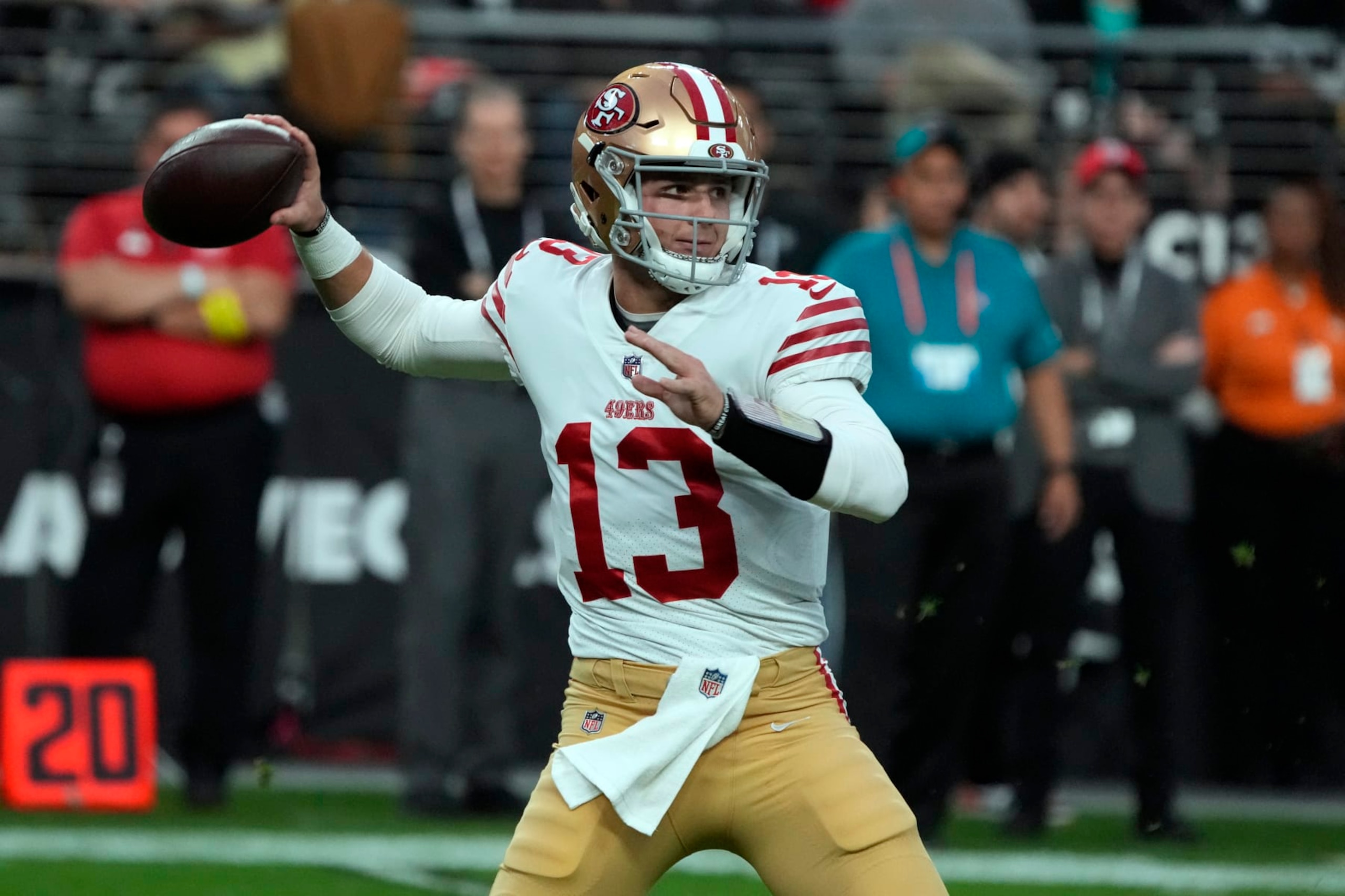 San Francisco 49ers quarterback Brock Purdy (13) throws the ball against the Las Vegas Raiders during the first half of an NFL football game, Sunday, Jan. 1, 2023, in Las Vegas. (AP Photo/Rick Scuteri)