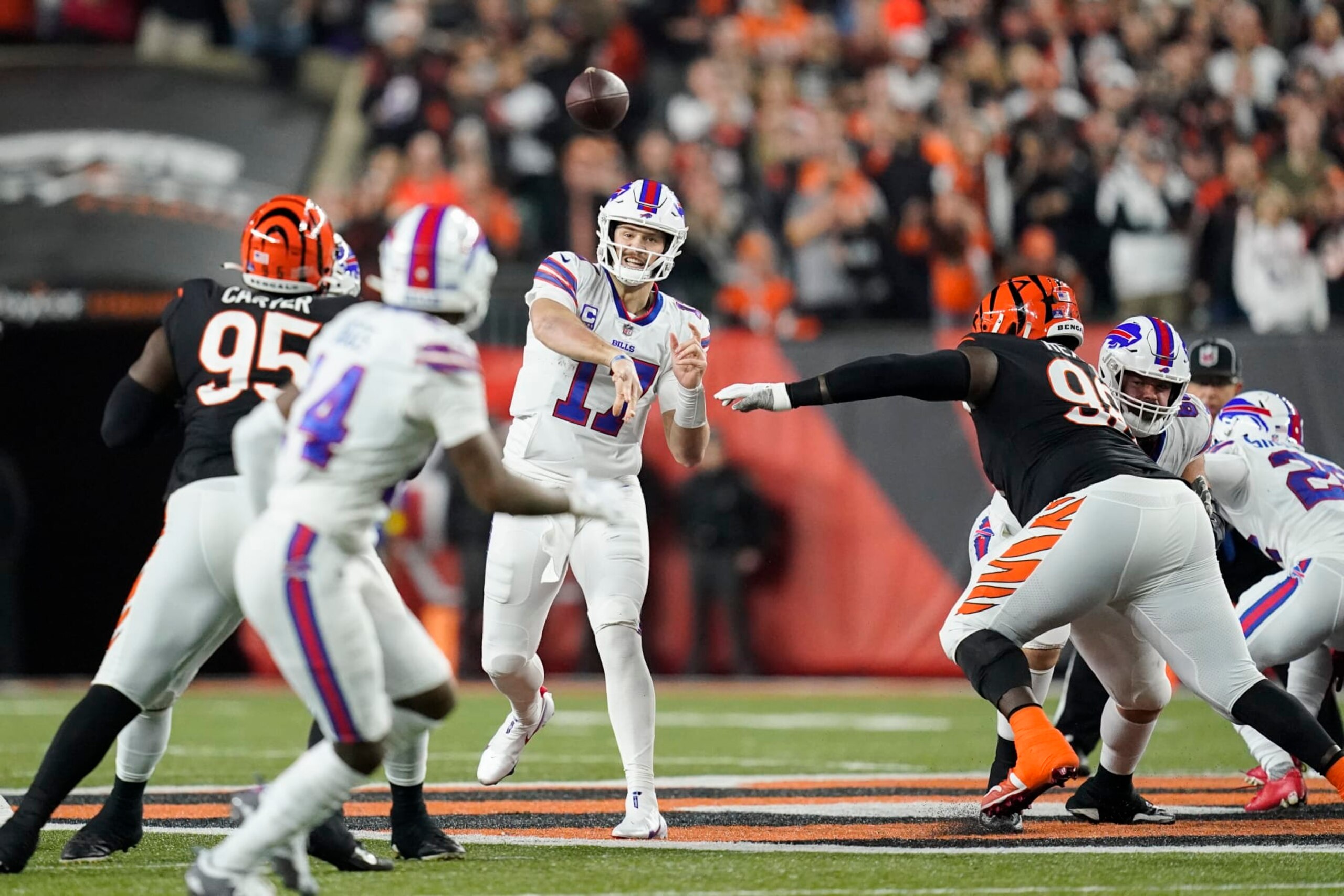 Buffalo Bills quarterback Josh Allen (17) passes during the first quarter of an NFL football game against the Cincinnati Bengals, Monday, Jan. 2, 2023, in Cincinnati. (AP Photo/Joshua A. Bickel)