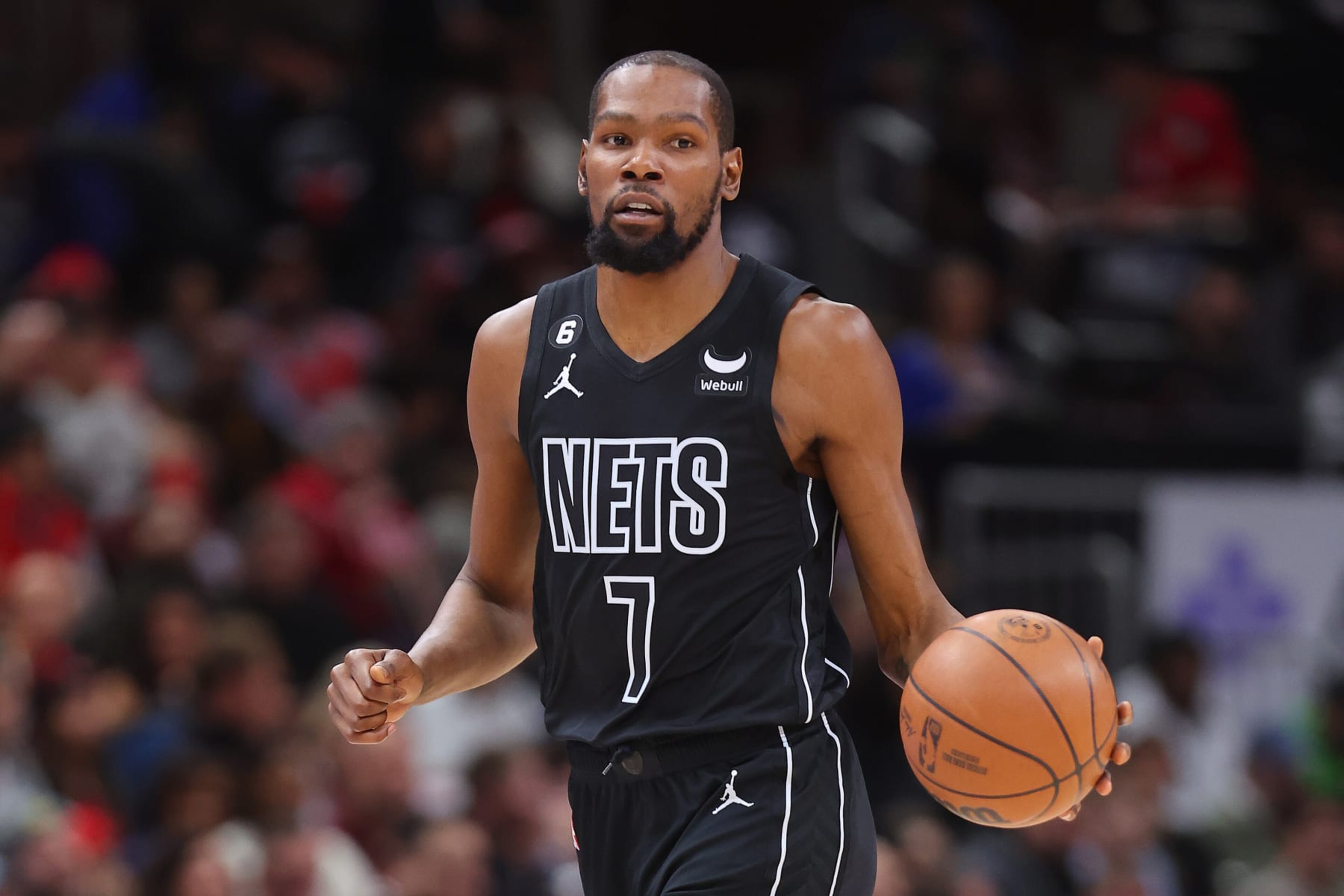 CHICAGO, ILLINOIS - JANUARY 04: Kevin Durant #7 of the Brooklyn Nets dribbles against the Chicago Bulls during the first half at United Center on January 04, 2023 in Chicago, Illinois. NOTE TO USER: User expressly acknowledges and agrees that, by downloading and or using this photograph, User is consenting to the terms and conditions of the Getty Images License Agreement. (Photo by Michael Reaves/Getty Images) CHICAGO, ILLINOIS - JANUARY 04: Kevin Durant #7 of the Brooklyn Nets dribbles against the Chicago Bulls during the first half at United Center on January 04, 2023 in Chicago, Illinois. NOTE TO USER: User expressly acknowledges and agrees that, by downloading and or using this photograph, User is consenting to the terms and conditions of the Getty Images License Agreement. (Photo by Michael Reaves/Getty Images)