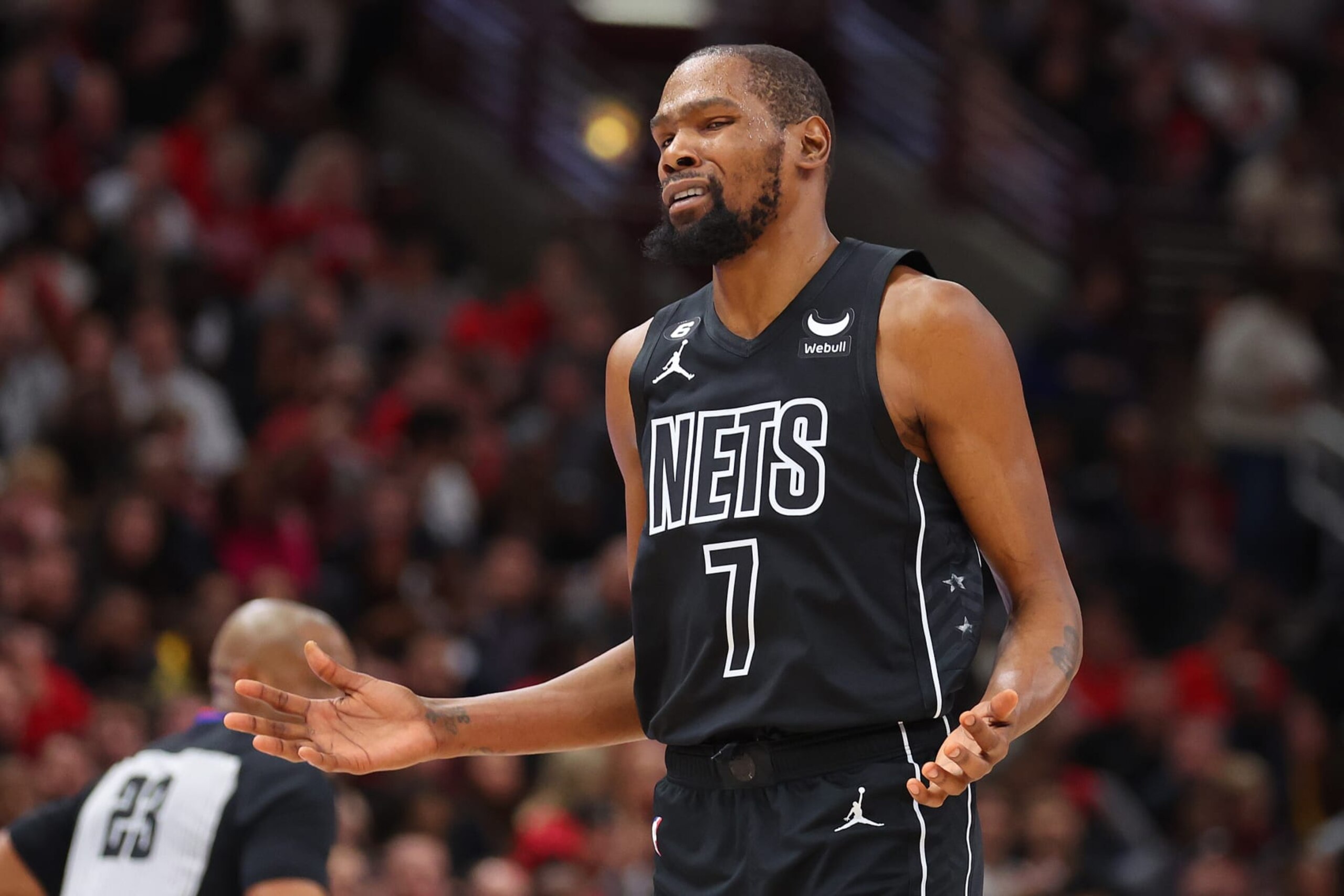 CHICAGO, ILLINOIS - JANUARY 04: Kevin Durant #7 of the Brooklyn Nets reacts against the Chicago Bulls during the first half at United Center on January 04, 2023 in Chicago, Illinois. NOTE TO USER: User expressly acknowledges and agrees that, by downloading and or using this photograph, User is consenting to the terms and conditions of the Getty Images License Agreement. (Photo by Michael Reaves/Getty Images)