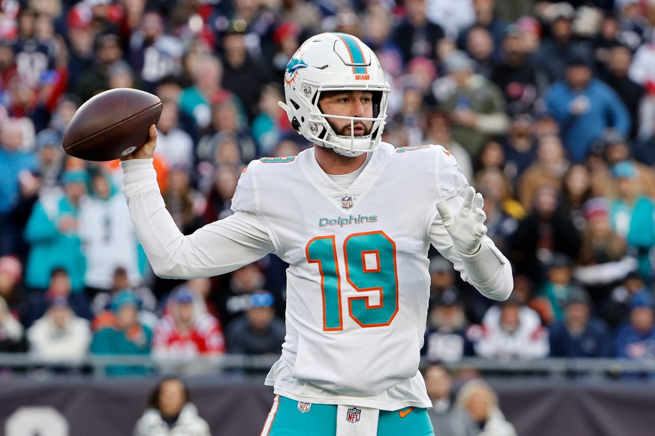 FOXBOROUGH, MASSACHUSETTS - JANUARY 01: Skylar Thompson #19 of the Miami Dolphins passes against the New England Patriots during the second half at Gillette Stadium on January 01, 2023 in Foxborough, Massachusetts. (Photo by Winslow Townson/Getty Images)
