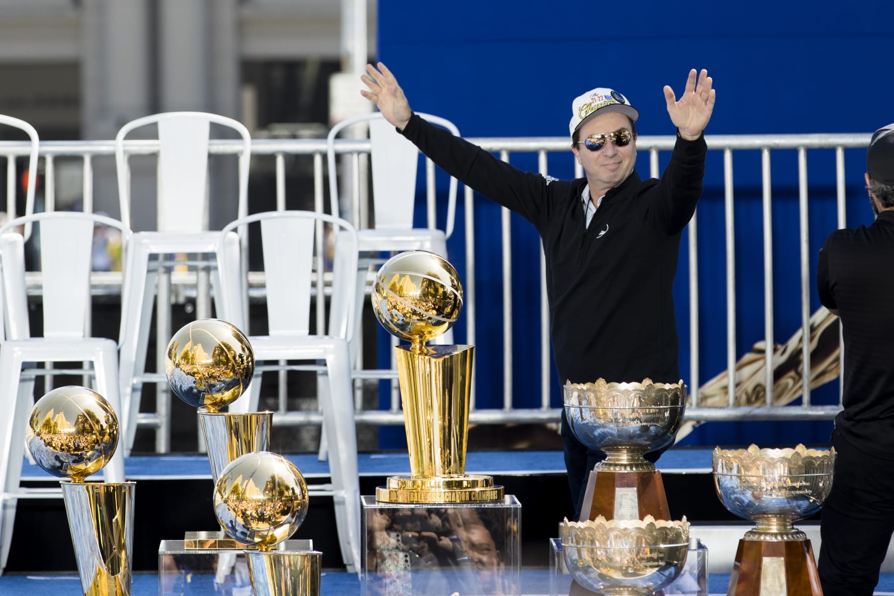 Golden State Warriors owner Joe Lacob gestures to the crowd before the NBA Championship parade in San Francisco, Monday, June 20, 2022, in San Francisco. (AP Photo/John Hefti)