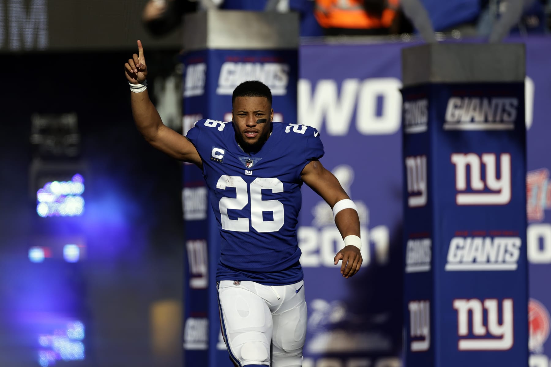 New York Giants running back Saquon Barkley (26) is introduced before an NFL football game against the Indianapolis Colts on Sunday, Jan. 1, 2023, in East Rutherford, N.J. (AP Photo/Adam Hunger)