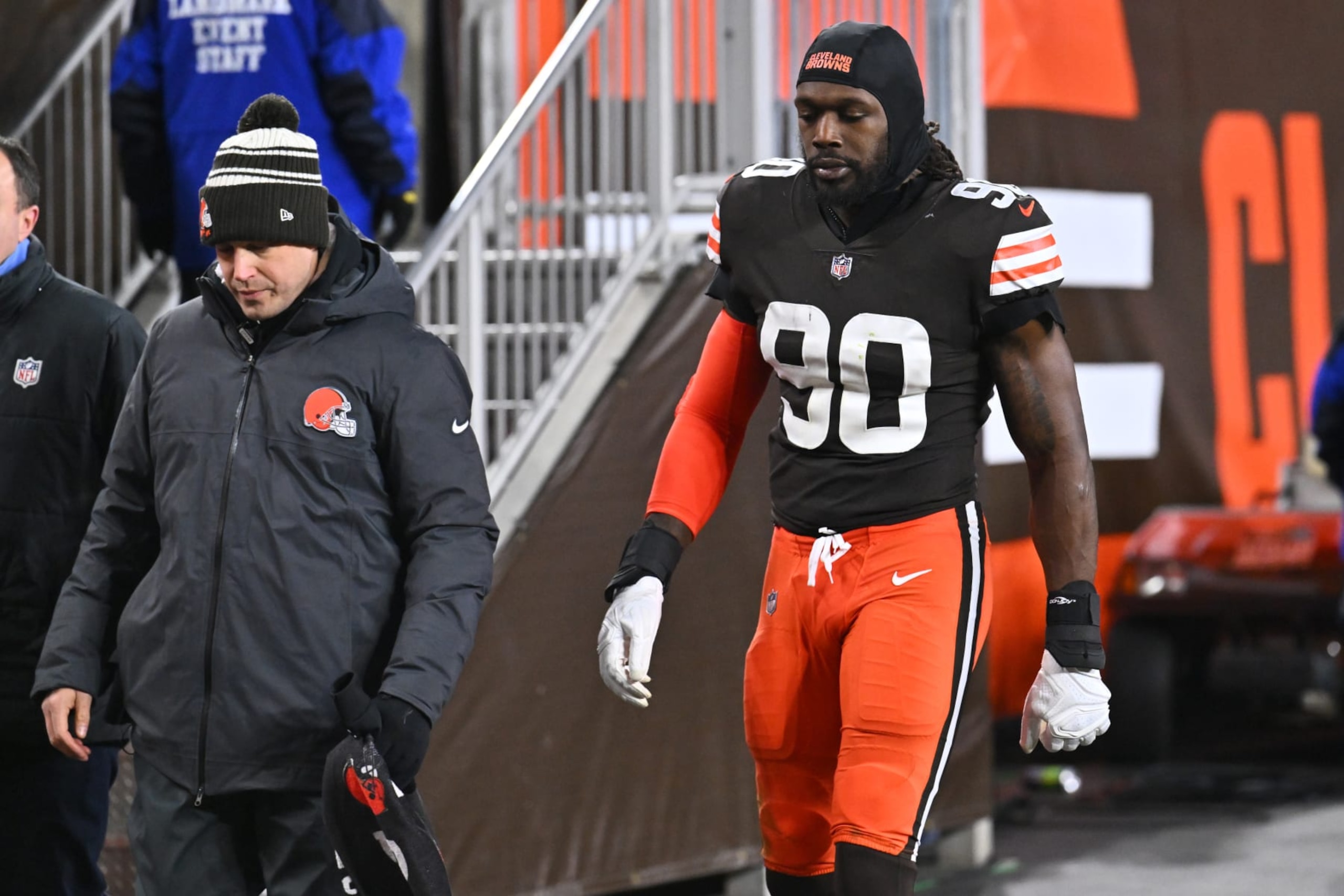 CLEVELAND, OHIO - DECEMBER 17: Cleveland Browns Jadeveon Clowney #90 of the Cleveland Browns leaves the game after being injured against the Baltimore Ravens during the first half at FirstEnergy Stadium on December 17, 2022 in Cleveland, Ohio. (Photo by Jason Miller/Getty Images)