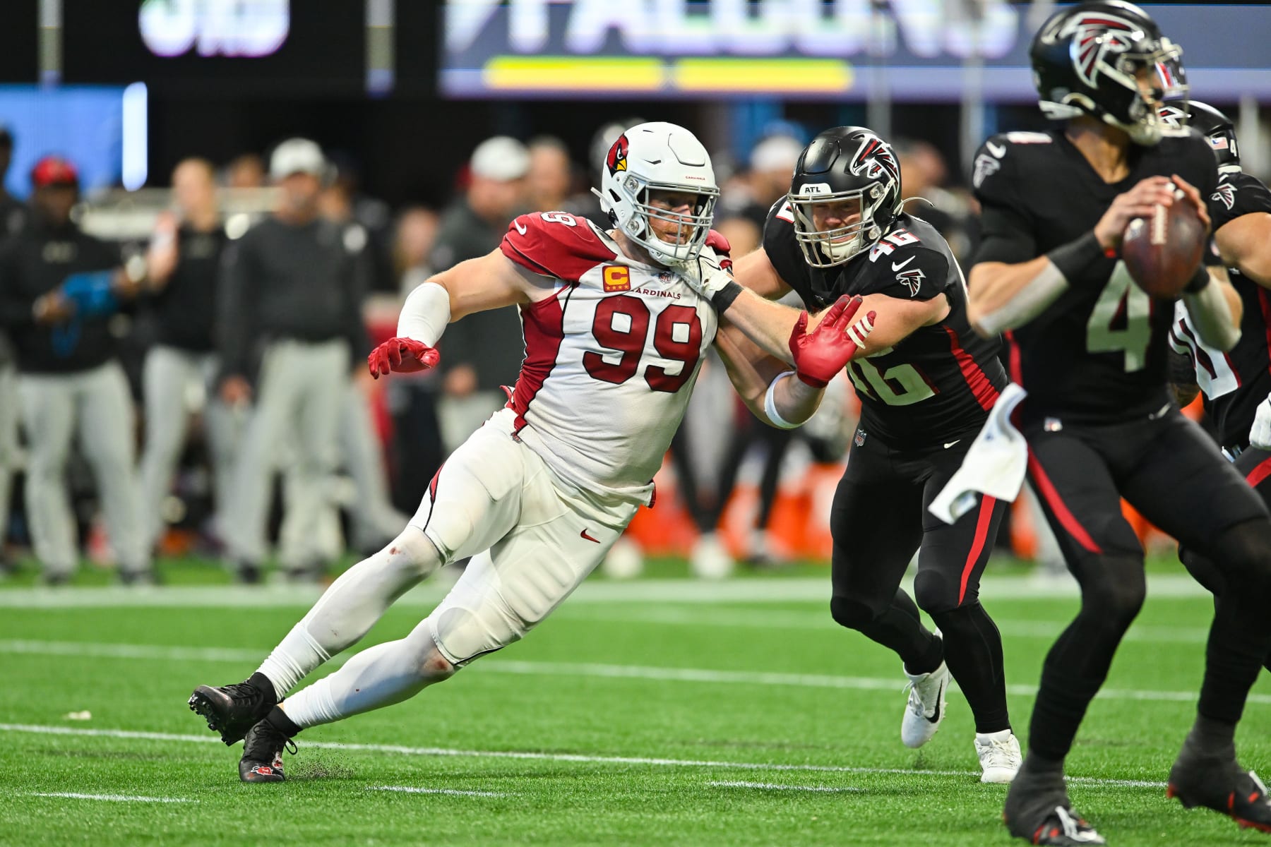 ATLANTA, GA  JANUARY 01:  Arizona defensive end J.J. Watt (99) applies defensive pressure during the NFL game between the Arizona Cardinals and the Atlanta Falcons on January 1st, 2023 at Mercedes-Benz Stadium in Atlanta, GA.  (Photo by Rich von Biberstein/Icon Sportswire via Getty Images)