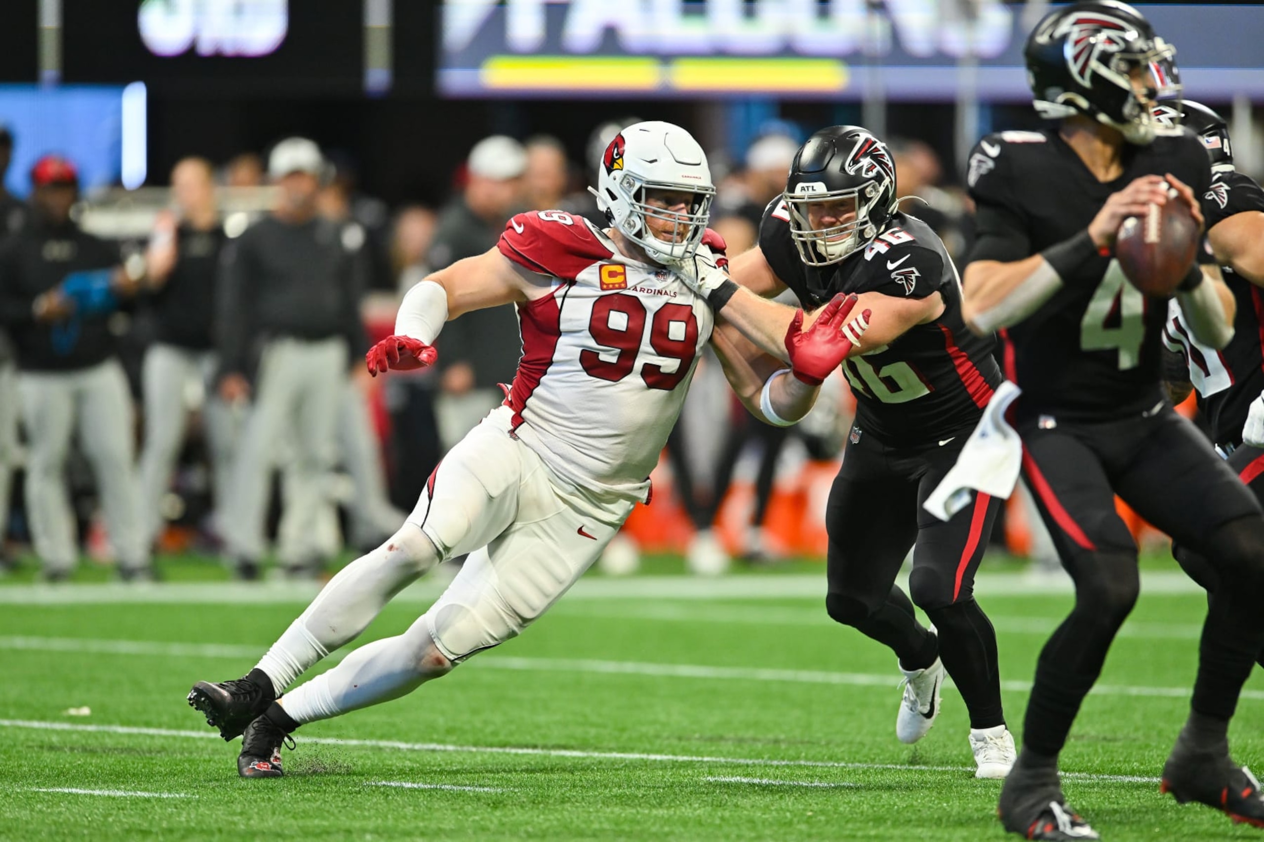 ATLANTA, GA  JANUARY 01:  Arizona defensive end J.J. Watt (99) applies defensive pressure during the NFL game between the Arizona Cardinals and the Atlanta Falcons on January 1st, 2023 at Mercedes-Benz Stadium in Atlanta, GA.  (Photo by Rich von Biberstein/Icon Sportswire via Getty Images)
