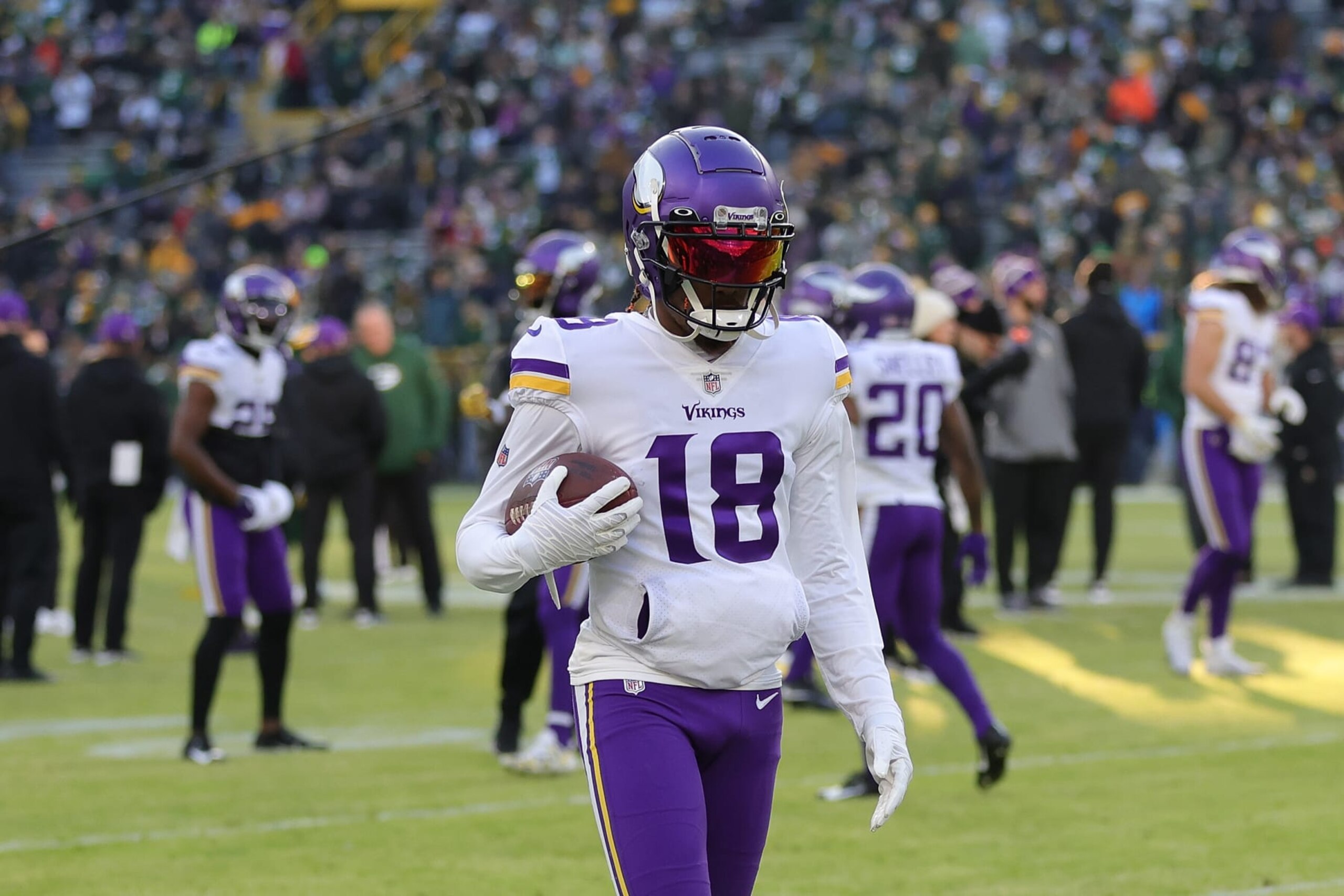 GREEN BAY, WISCONSIN - JANUARY 01: Justin Jefferson #18 of the Minnesota Vikings participates in warmups prior to a game against the Green Bay Packers at Lambeau Field on January 01, 2023 in Green Bay, Wisconsin. The Packers defeated the Vikings 41-17.  (Photo by Stacy Revere/Getty Images)