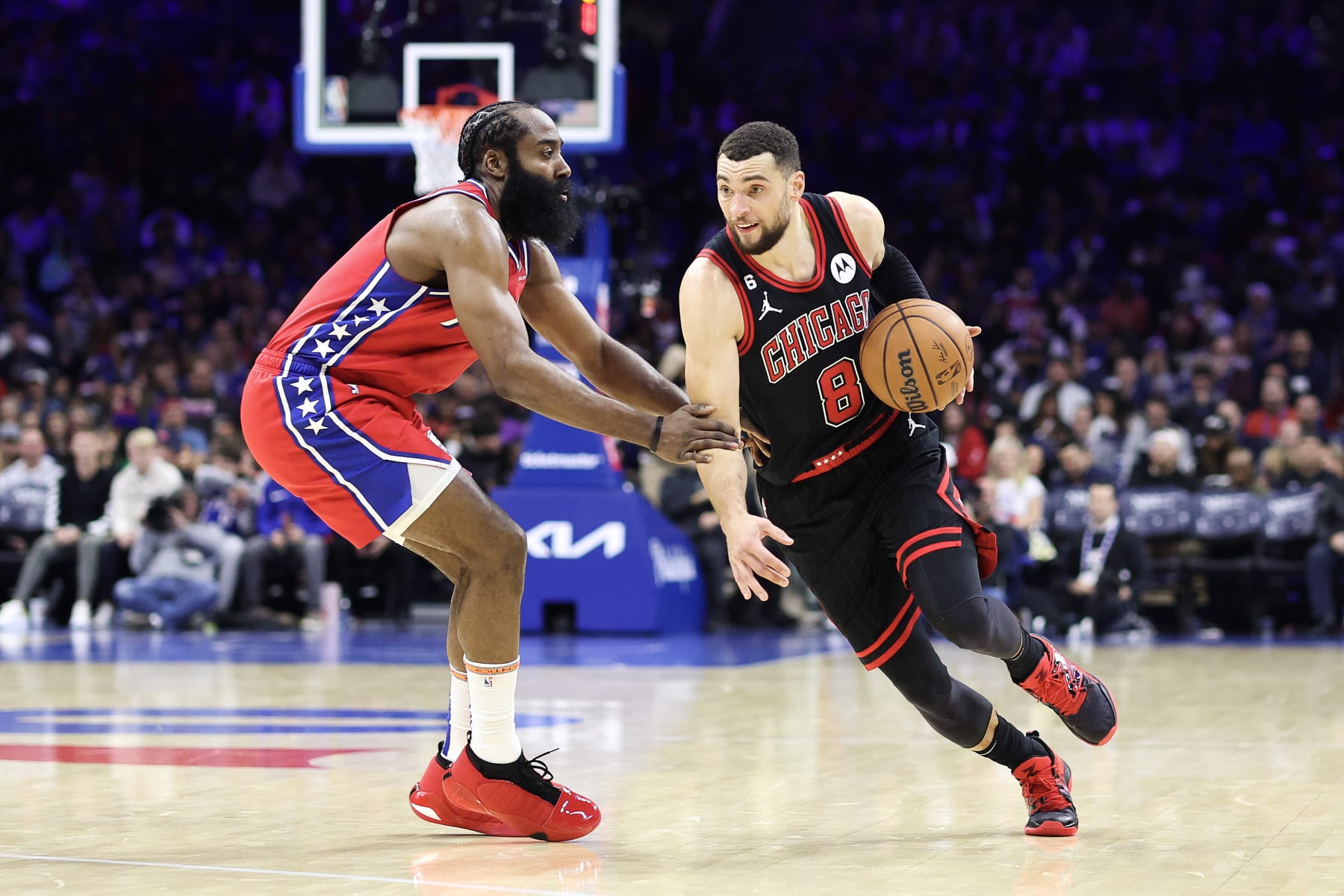 PHILADELPHIA, PENNSYLVANIA - JANUARY 06: Zach LaVine #8 of the Chicago Bulls drives past James Harden #1 of the Philadelphia 76ers during the second quarter at Wells Fargo Center on January 06, 2023 in Philadelphia, Pennsylvania. NOTE TO USER: User expressly acknowledges and agrees that, by downloading and or using this photograph, User is consenting to the terms and conditions of the Getty Images License Agreement. (Photo by Tim Nwachukwu/Getty Images)