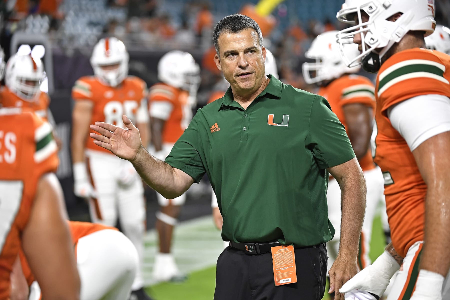 MIAMI GARDENS, FL - NOVEMBER 26:  Miami head coach Mario Cristobal instructs his players prior to the game as the Miami Hurricanes faced the Pittsburgh Panthers on November 26, 2022, at Hard Rock Stadium in Miami Gardens, Florida. (Photo by Samuel Lewis/Icon Sportswire via Getty Images)